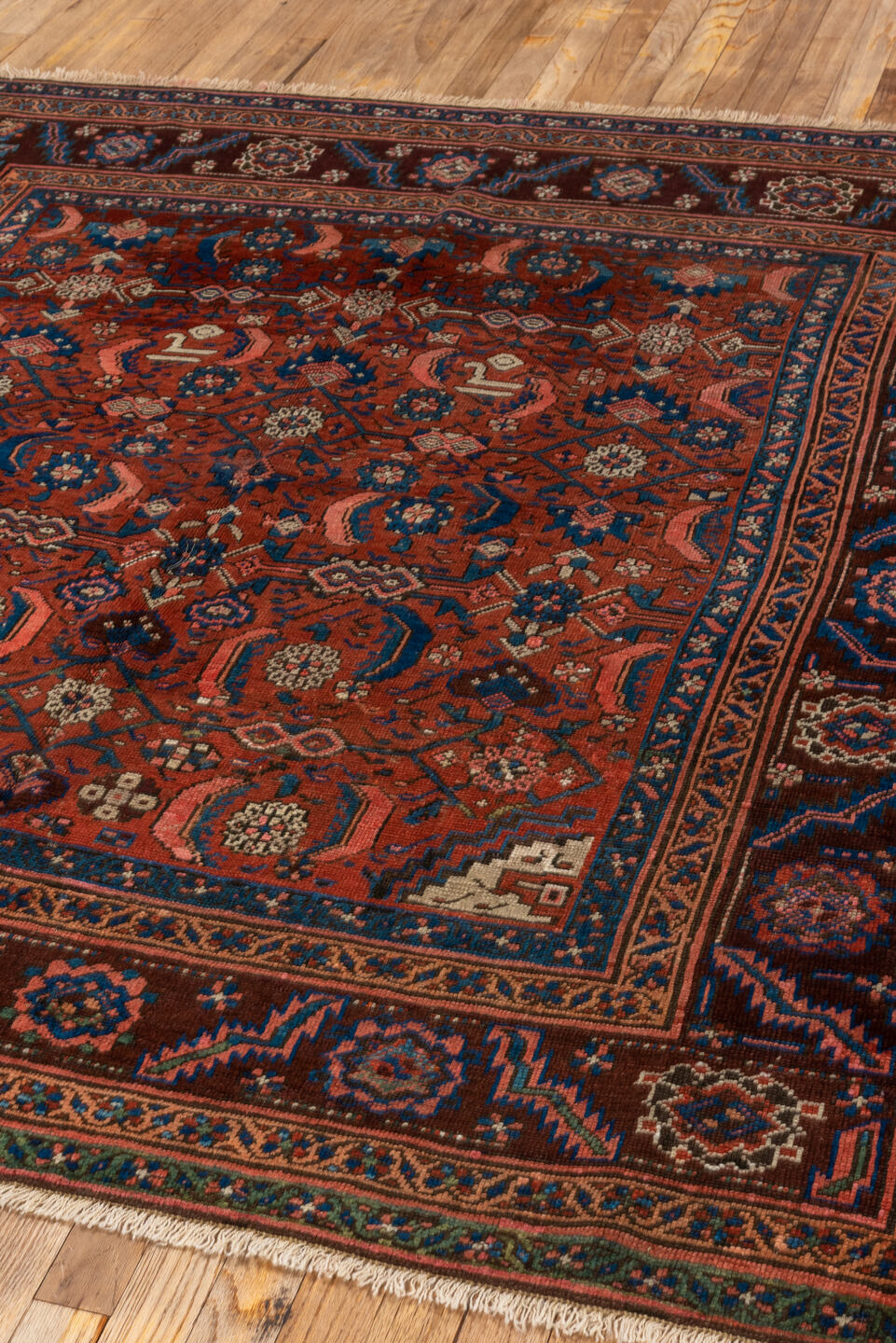 6' x 6' one-of-a-kind handmade vintage Bakhshayesh rug. Color palette: arapawa, black, blue, brown, gray, pink, red