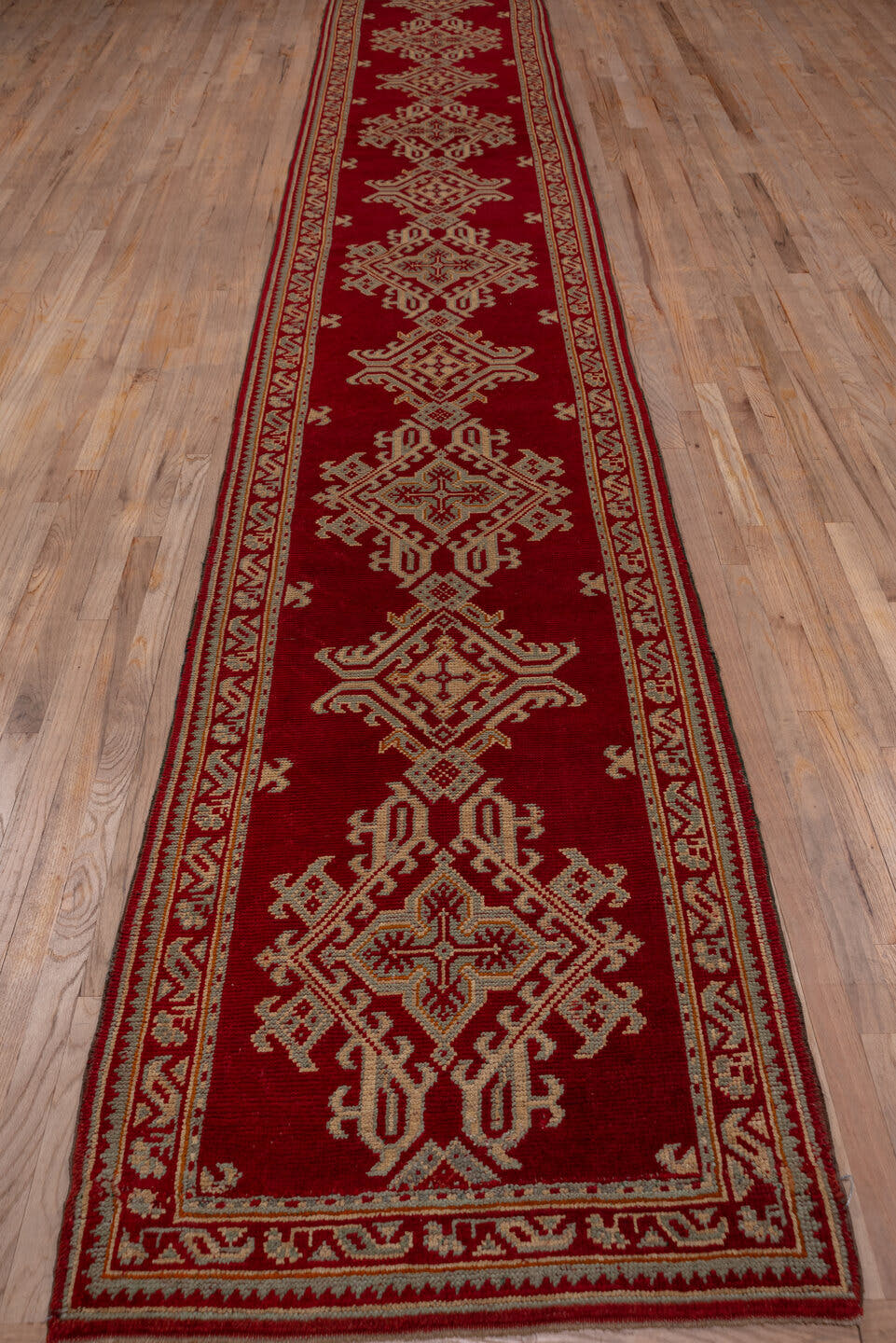 3' x 17' one-of-a-kind handmade vintage Oushak runner rug. Color palette: crimson, ivory, burgundy, red