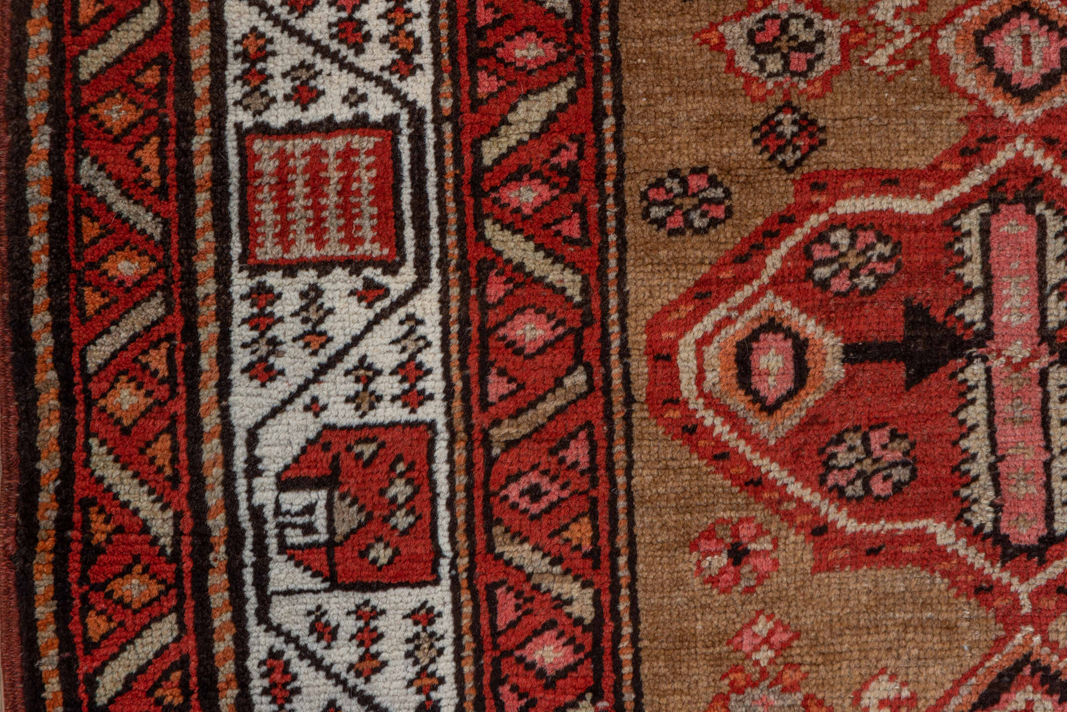 3' x 10' one-of-a-kind handmade vintage Sarab runner rug. Color palette: brown, gray, light gray, maroon, off-white, pink