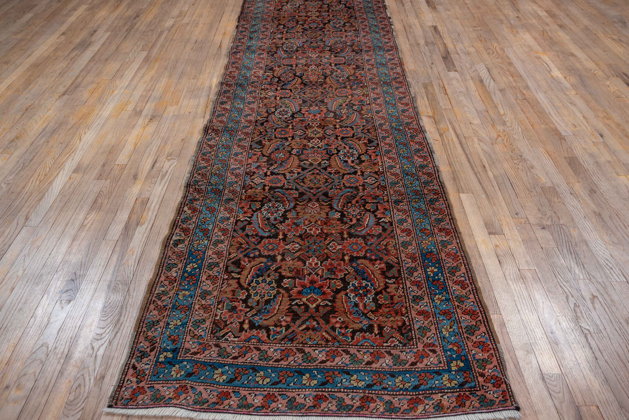 3' x 13' one-of-a-kind handmade vintage Bakhshayesh runner rug. Color palette: black, blue, brown, gray, pink, red