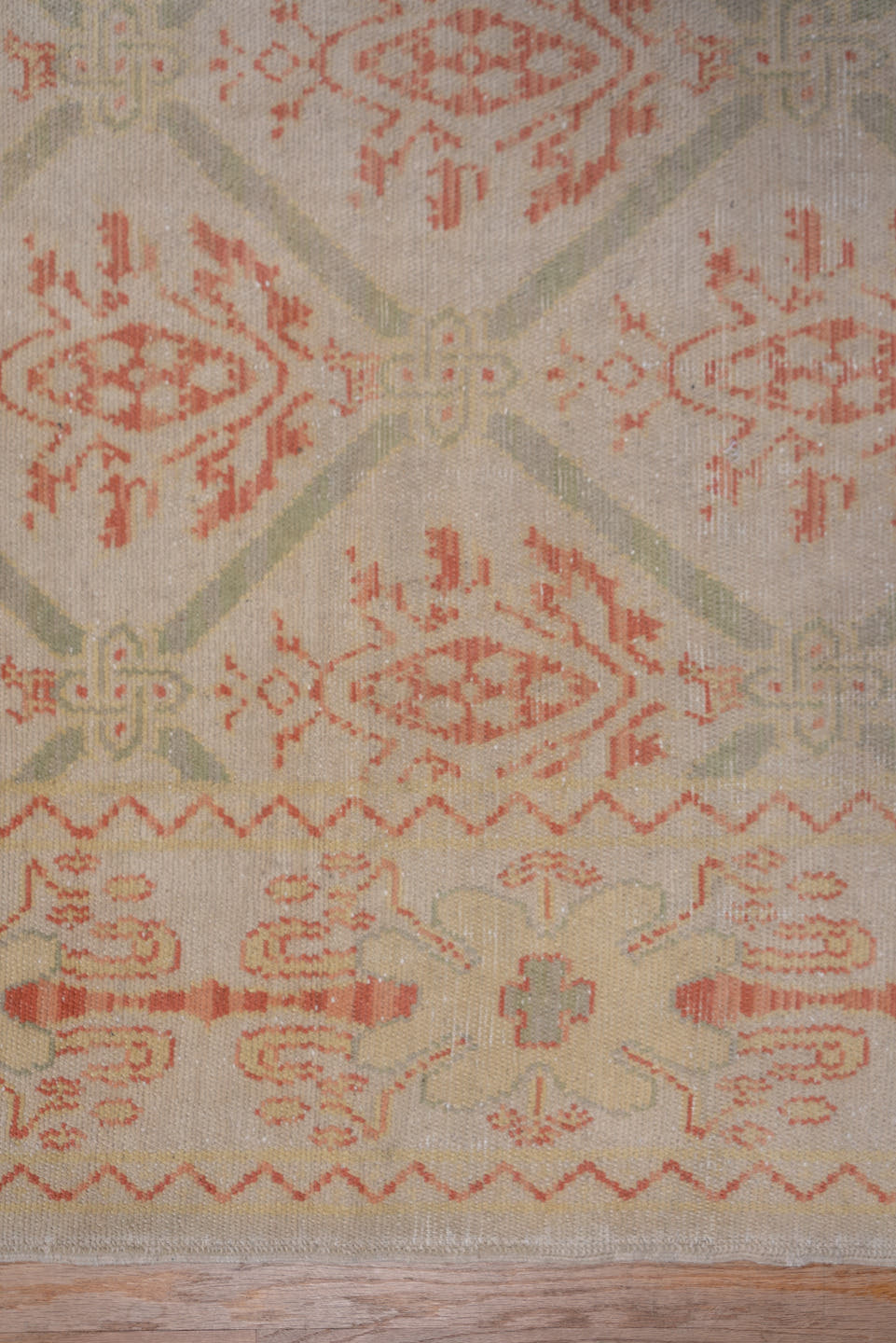 10' x 17' one-of-a-kind handmade antique Spanish rug. Color palette: ivory, coral, sage, cream, blush, taupe, terracotta