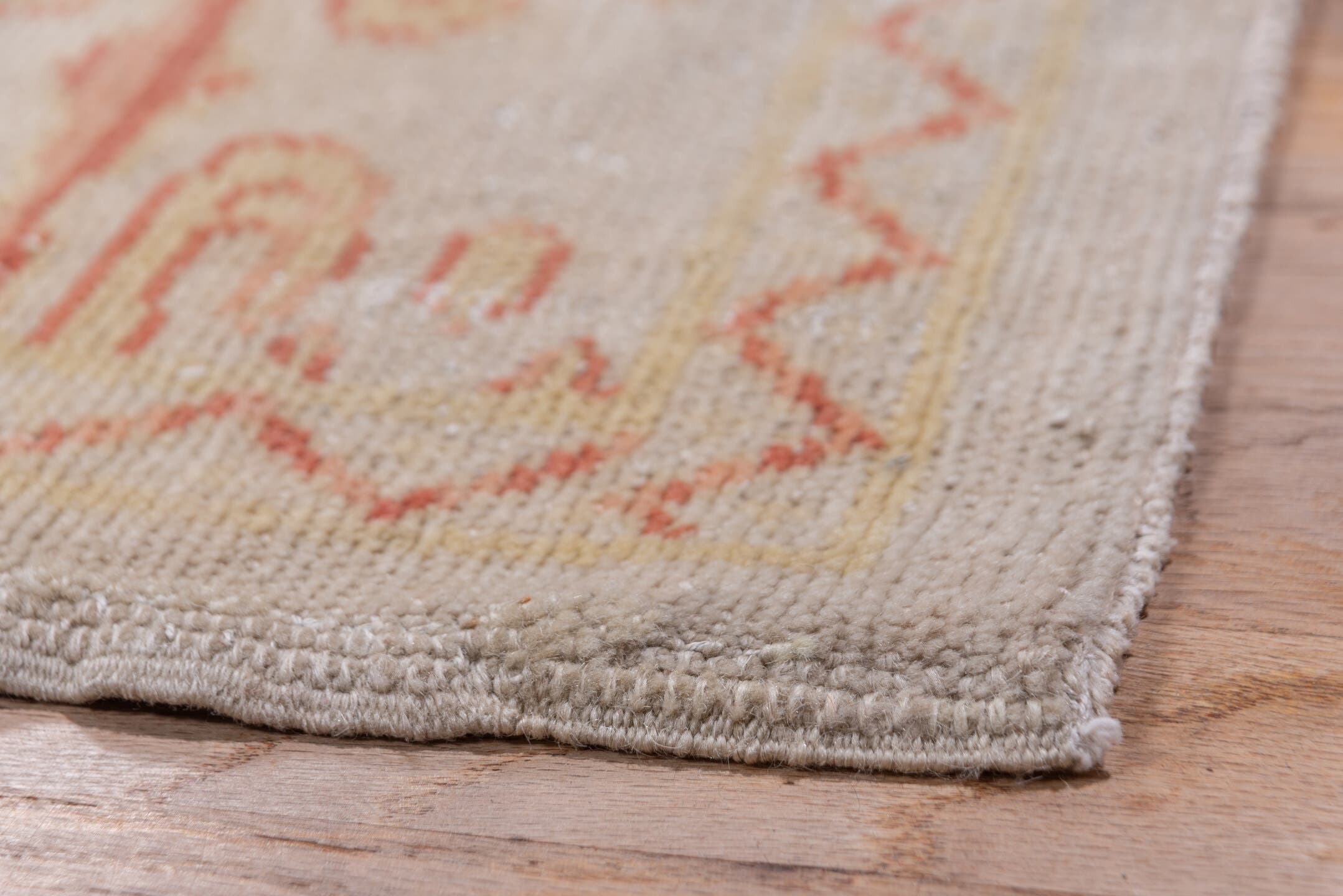 10' x 17' one-of-a-kind handmade antique Spanish rug. Color palette: ivory, coral, sage, cream, blush, taupe, terracotta