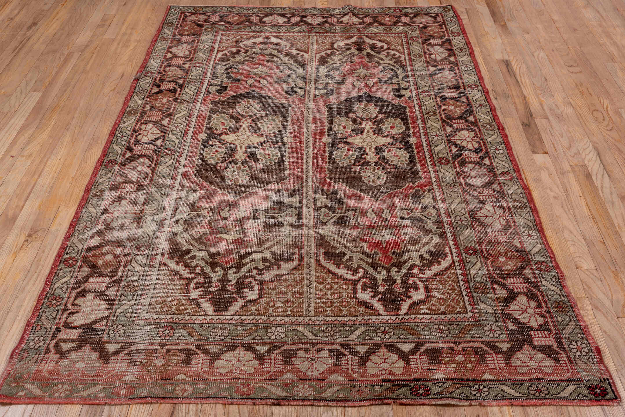 4' x 7' one-of-a-kind handmade vintage Oushak rug. Color palette: brown, gray, light gray, pink, red, redwood