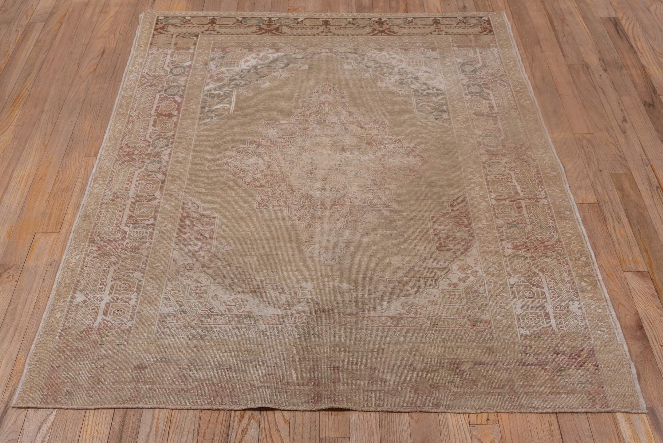 4' x 5' one-of-a-kind handmade vintage Kaisary small size rug. Color palette: camel, taupe, rose, ivory, sage, terra cotta