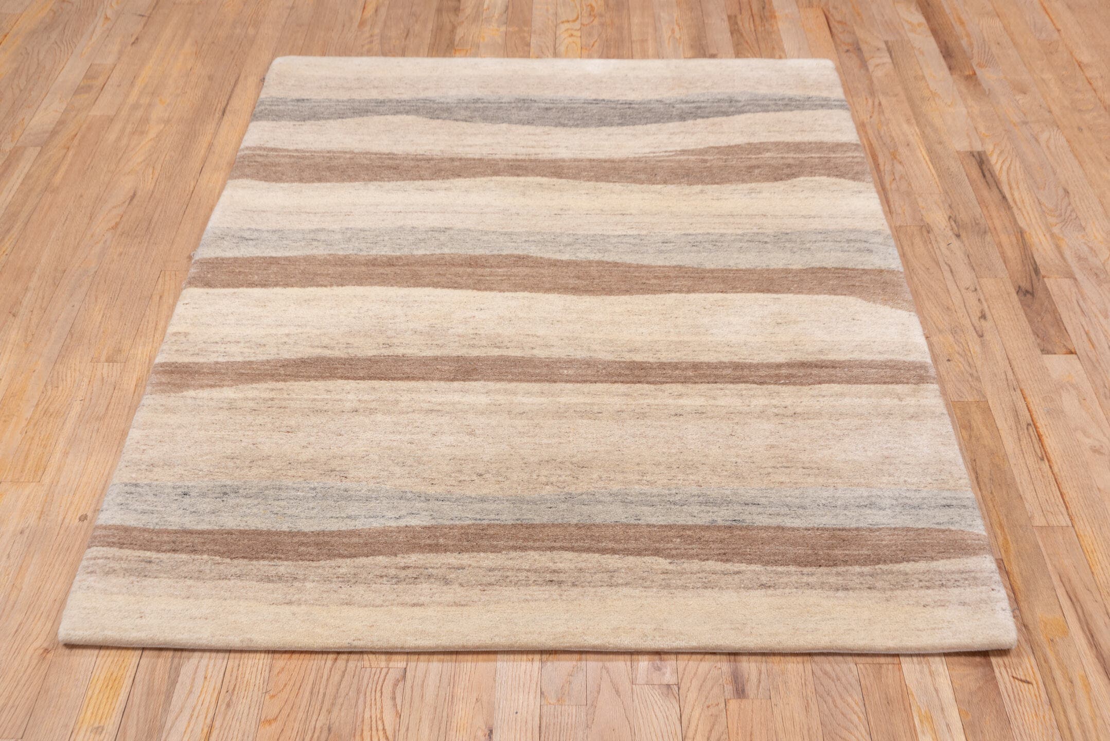 4' x 6' one-of-a-kind handmade vintage Ocean small size rug. Color palette: ivory, taupe, camel, gray, beige