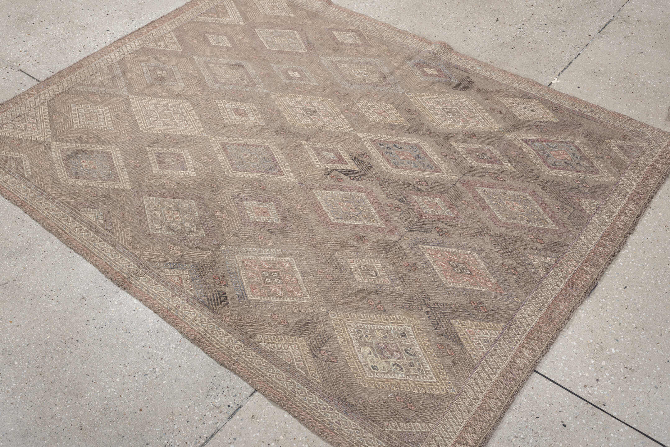 4' x 5' one-of-a-kind handmade vintage Jijim rug. Color palette: taupe, ivory, blush, slate, dusty rose, beige, charcoal