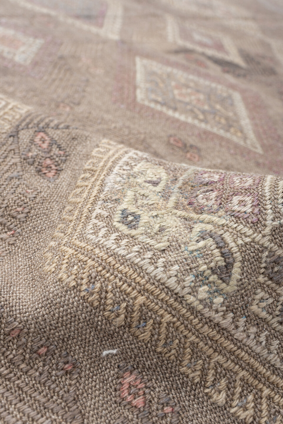 4' x 5' one-of-a-kind handmade vintage Jijim rug. Color palette: taupe, ivory, blush, slate, dusty rose, beige, charcoal