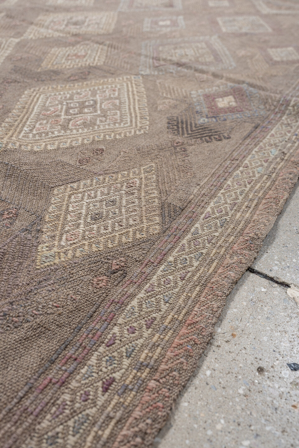 4' x 5' one-of-a-kind handmade vintage Jijim rug. Color palette: taupe, ivory, blush, slate, dusty rose, beige, charcoal