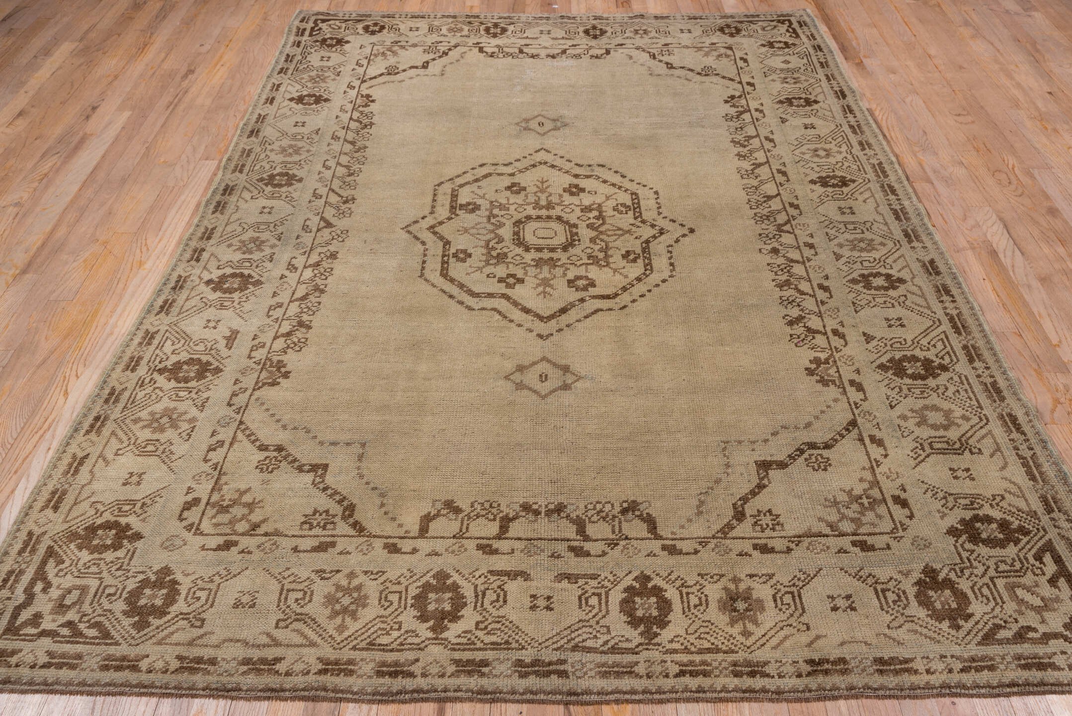 6' x 9' one-of-a-kind handmade vintage Oushak medium size rug. Color palette: taupe, brown, beige, ivory, gray