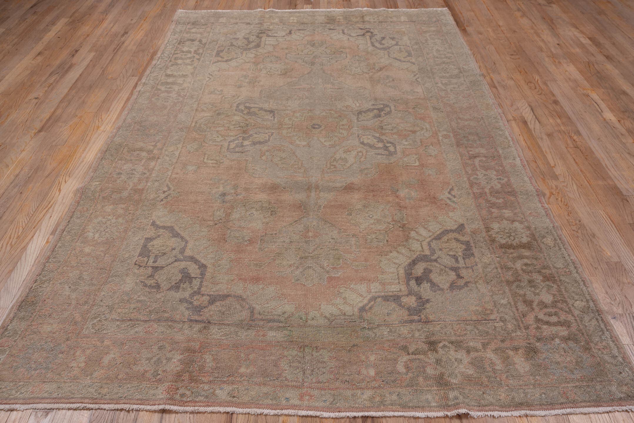 6' x 10' one-of-a-kind handmade vintage Oushak large size rug. Color palette: blush, taupe, ivory, sage, lavender, rose