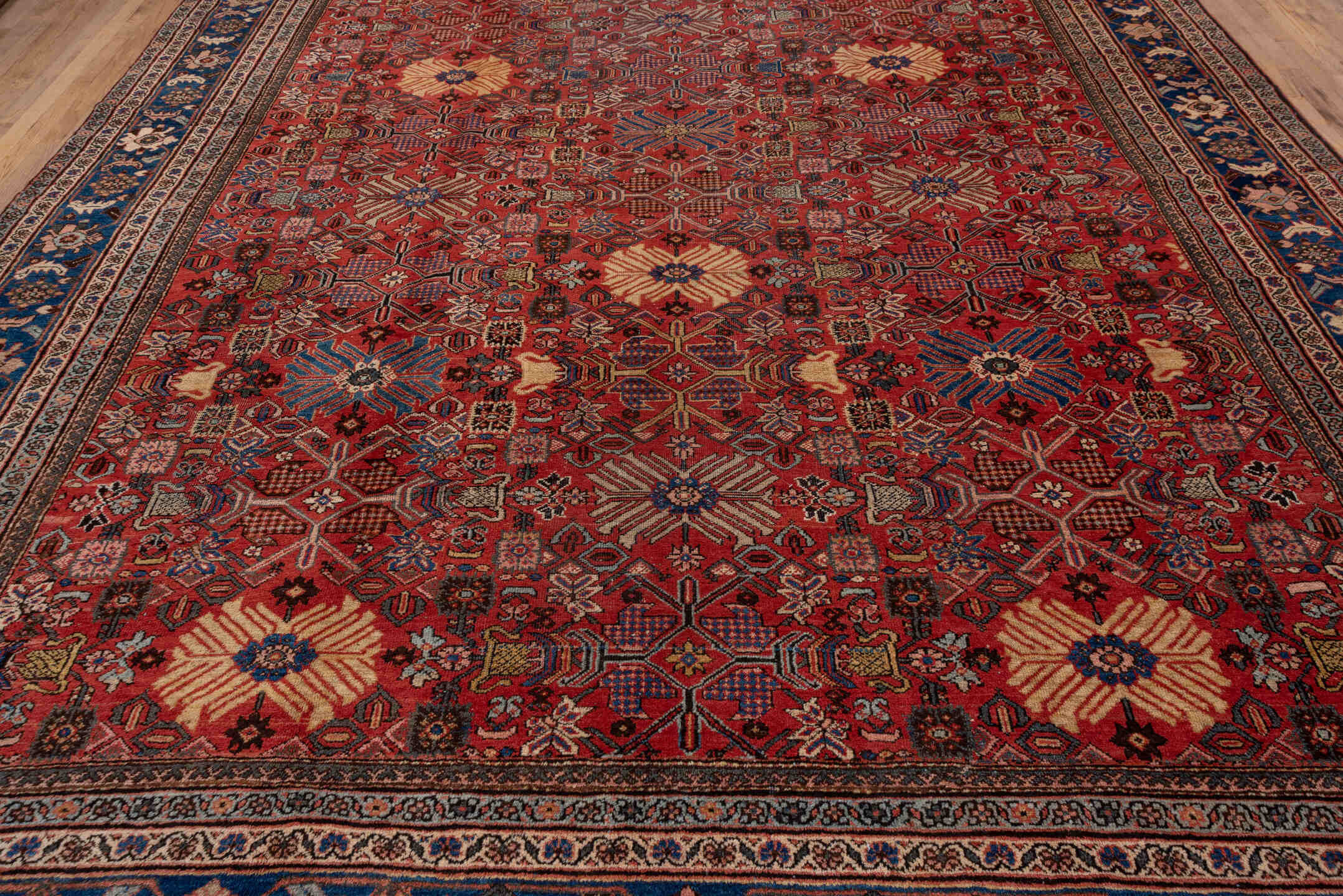 11' x 19' one-of-a-kind handmade vintage Mahal oversize rug. Color palette: red, navy, ivory, slate, rose, camel, charcoal