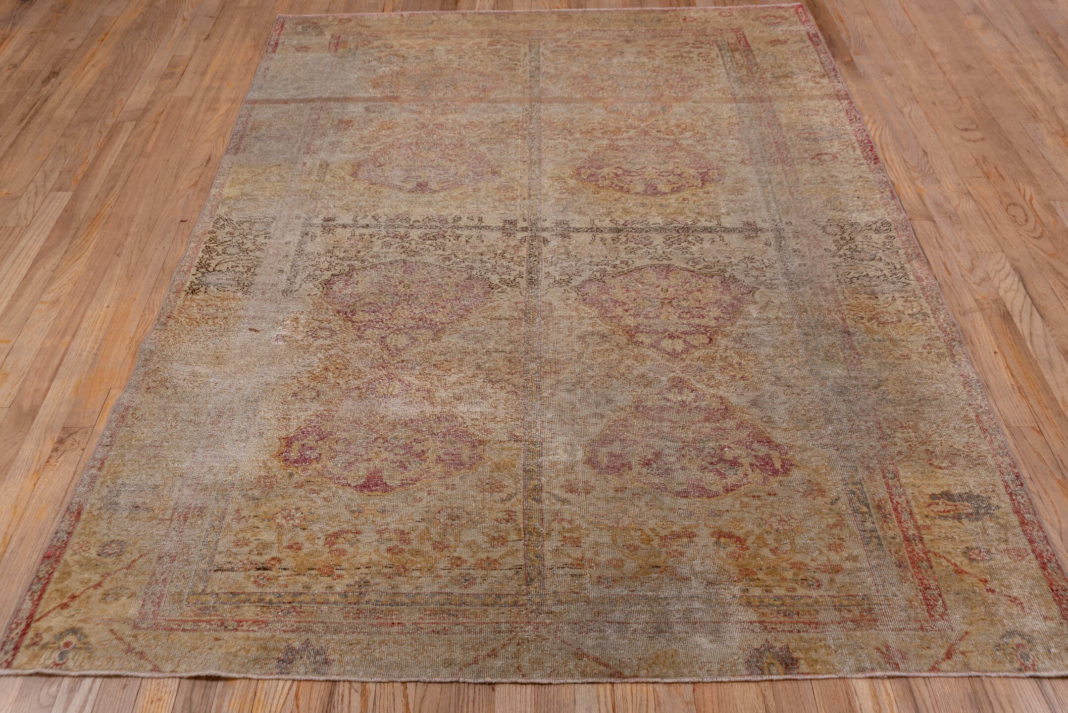 5' x 8' one-of-a-kind handmade vintage Sivas medium size rug. Color palette: tan, taupe, rose, gold, beige, dusty pink
