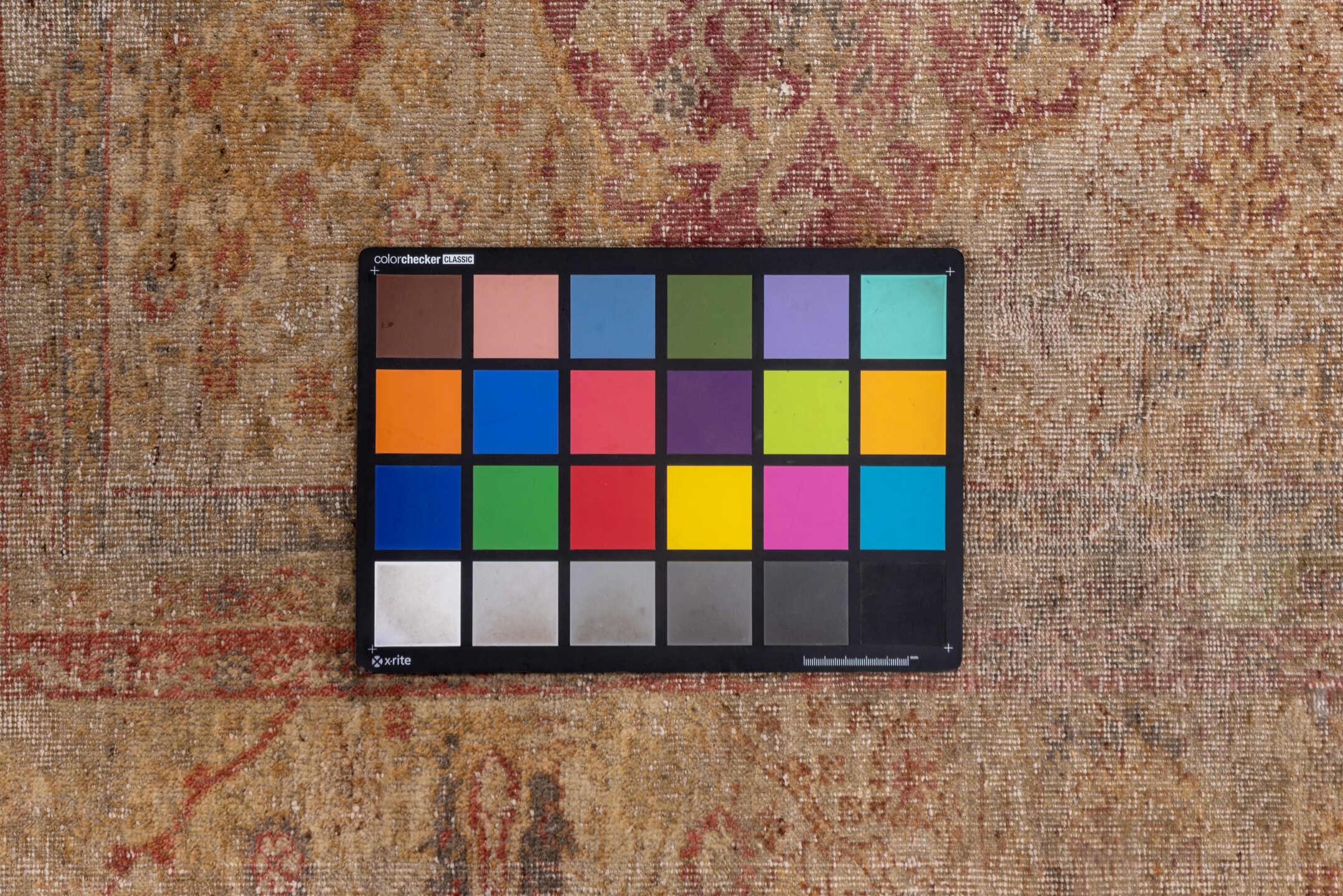 5' x 8' one-of-a-kind handmade vintage Sivas medium size rug. Color palette: brown, gray, light gray, off-white, pink