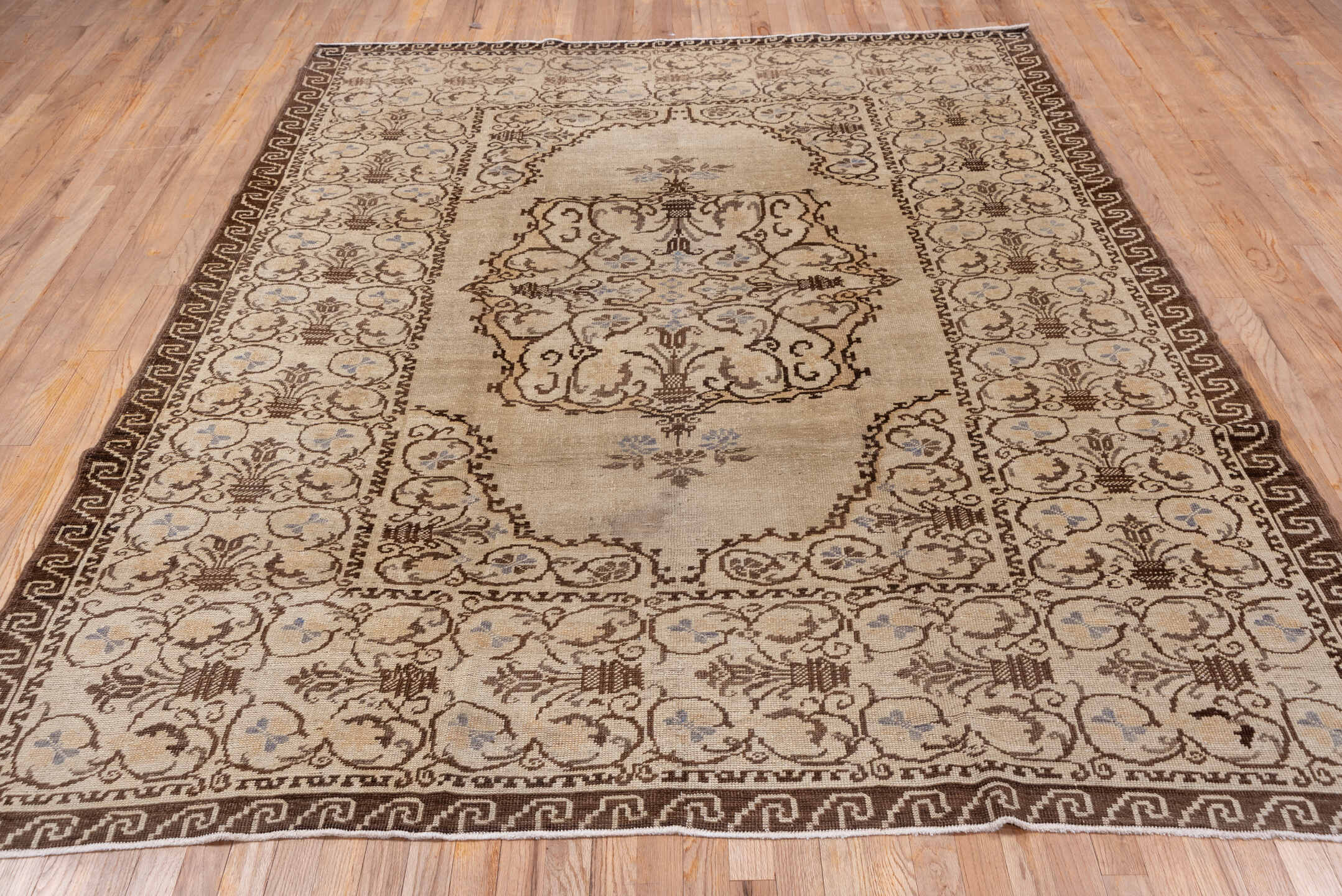 6' x 9' one-of-a-kind handmade vintage Oushak medium size rug. Color palette: ivory, brown, taupe, pale blue, beige, gray