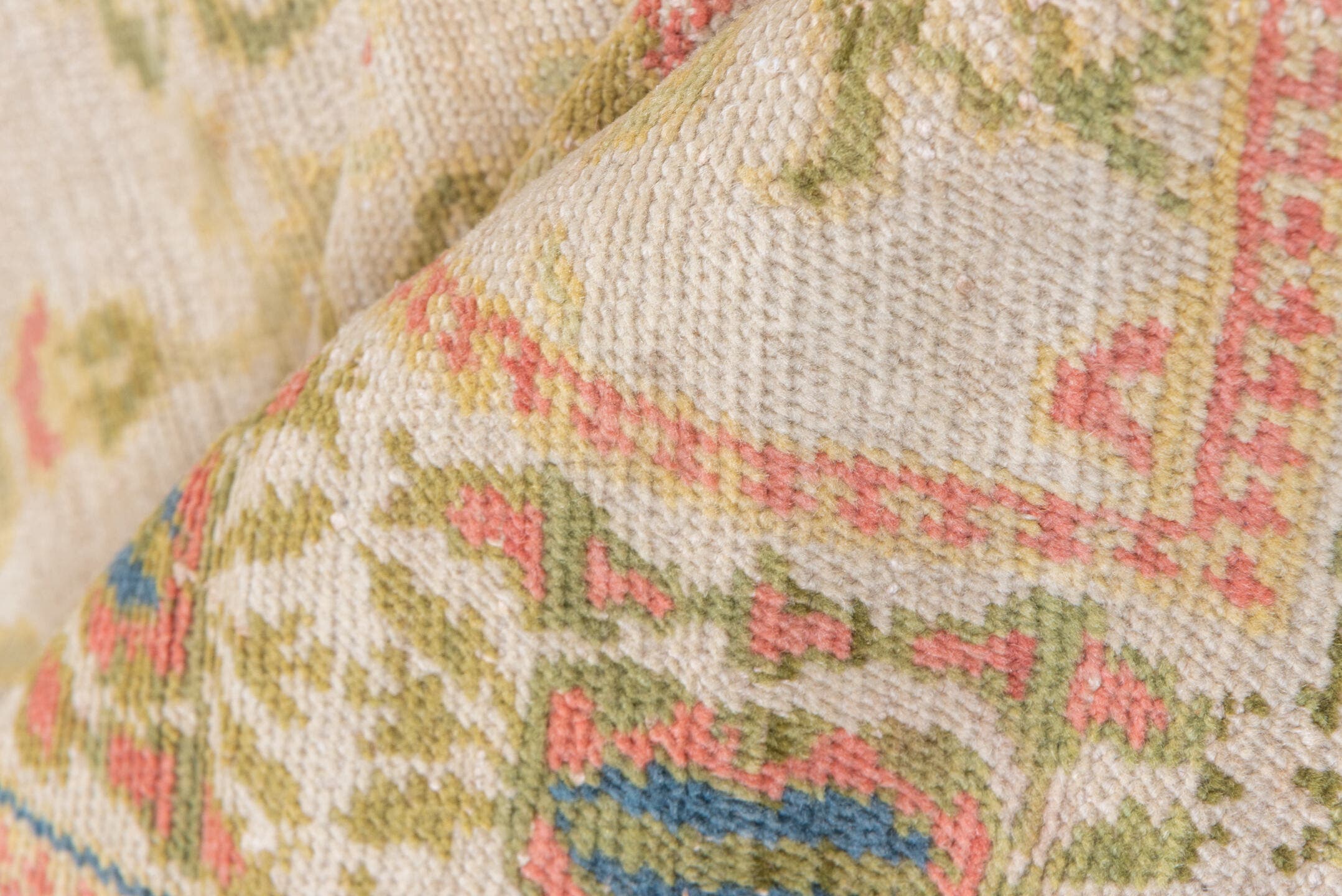 5' x 7' one-of-a-kind handmade antique Spanish rug. Color palette: ivory, olive, rose, gold, navy, sage, green, pink, red