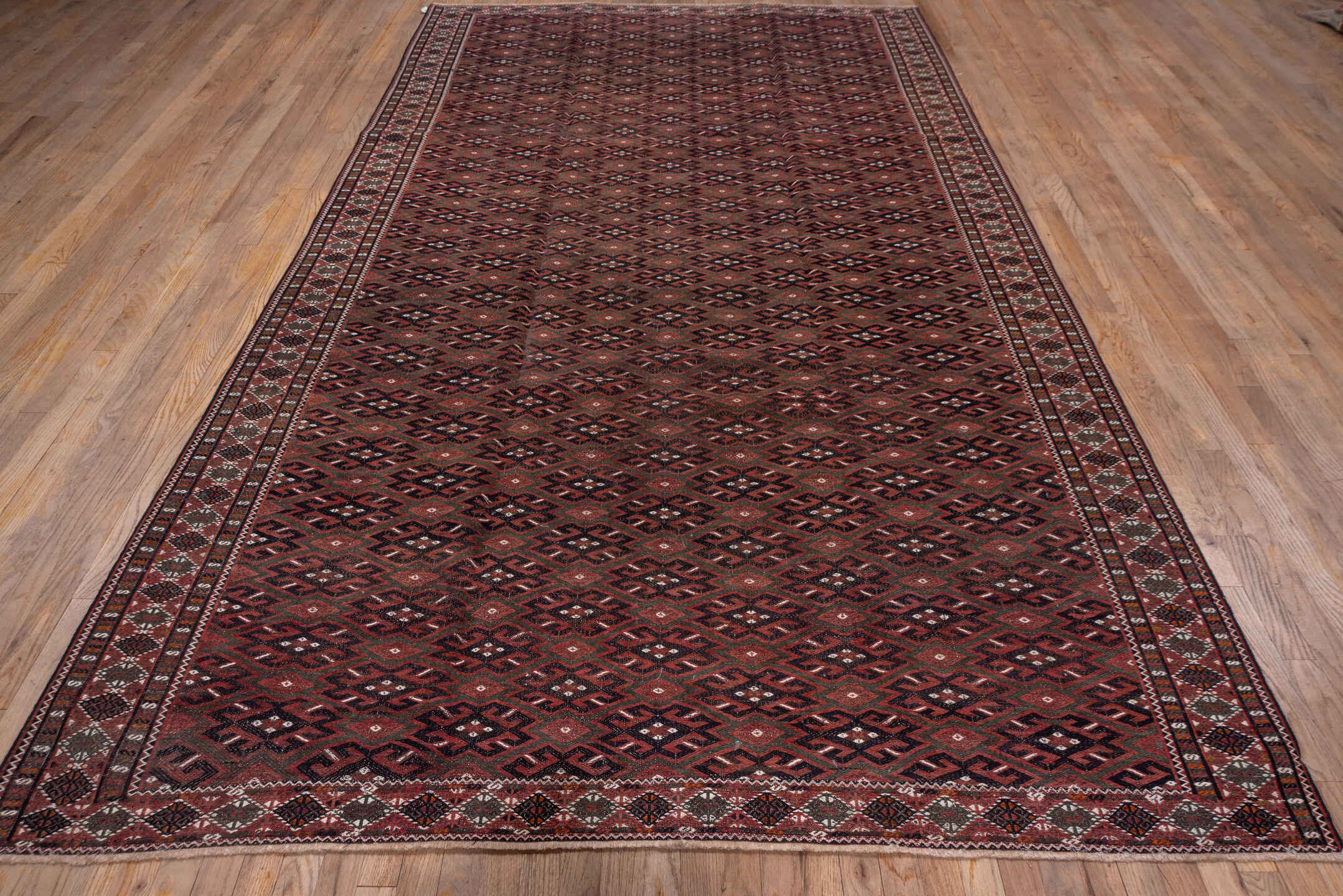 6' x 11' one-of-a-kind handmade vintage Kilim large size rug. Color palette: burgundy, brown, charcoal, ivory, rust, taupe