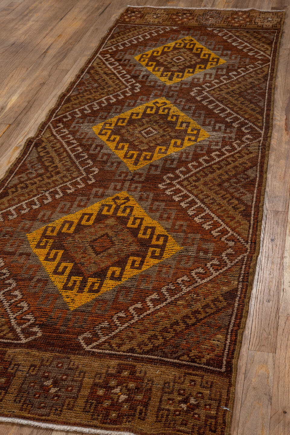 2' x 8' one-of-a-kind handmade vintage Oushak runner rug. Color palette: brown, rust, gold, taupe, camel, ivory, ochre