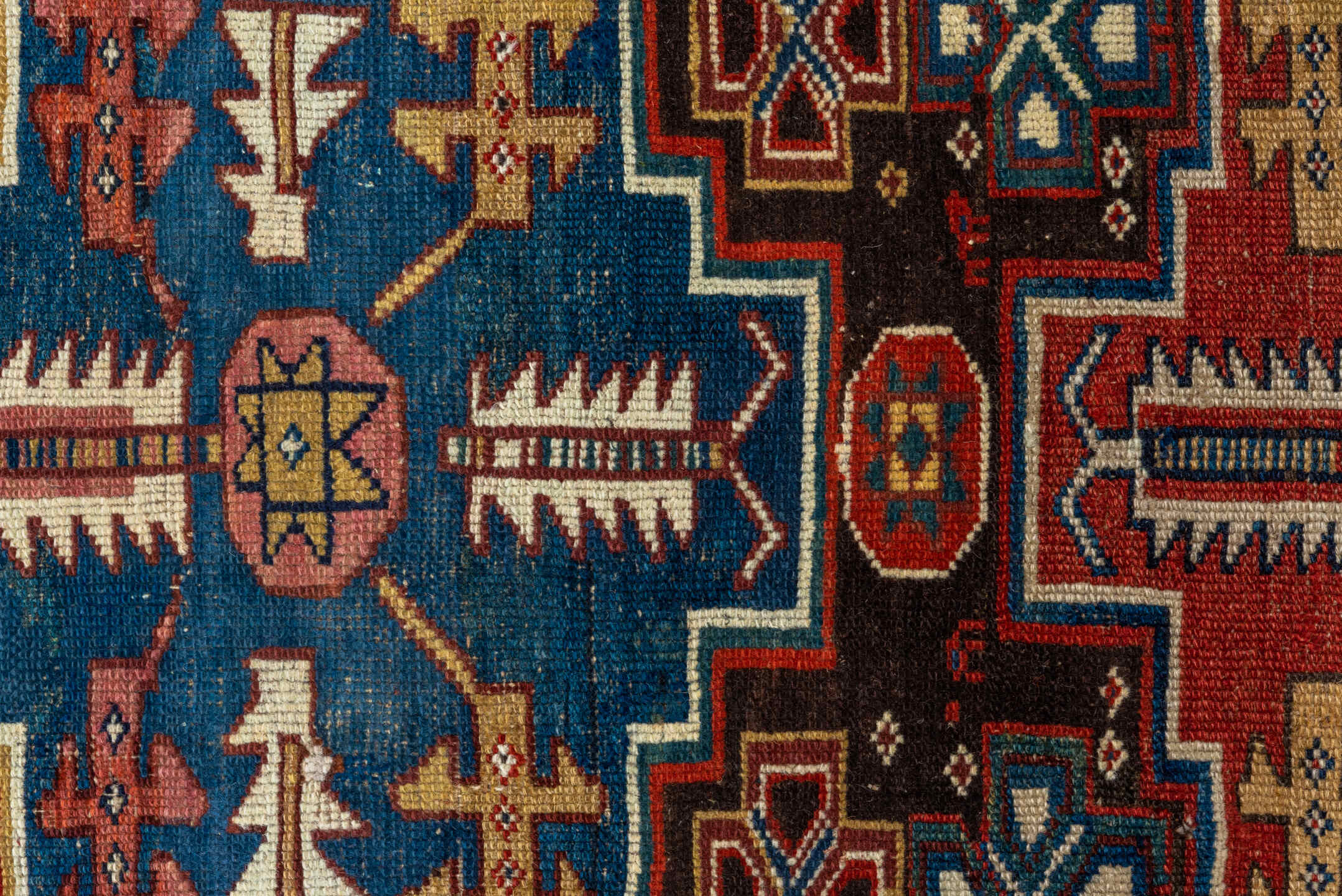 3' x 9' one-of-a-kind handmade vintage Malayer runner rug. Color palette: red, ivory, blue, charcoal, camel, rust, teal
