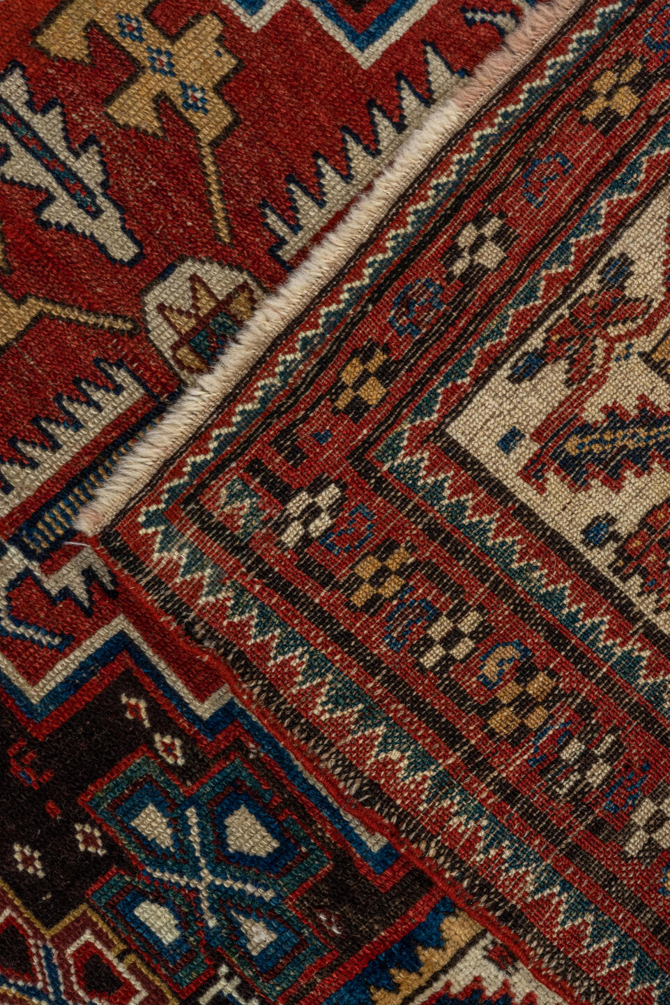 3' x 9' one-of-a-kind handmade vintage Malayer runner rug. Color palette: red, ivory, blue, charcoal, camel, rust, teal