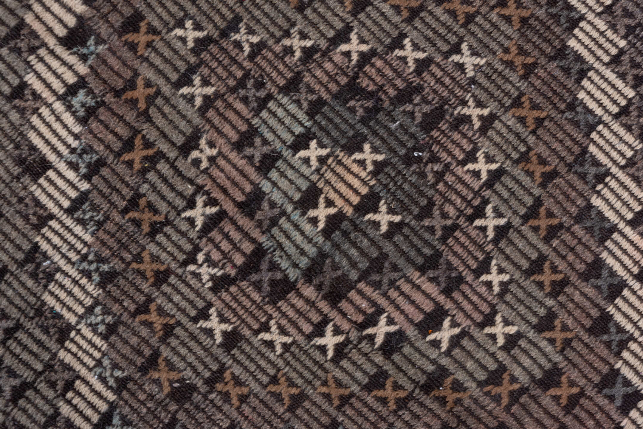 7' x 9' one-of-a-kind handmade vintage Jijim rug. Color palette: charcoal, ivory, slate, taupe, brown, gray, black, beige