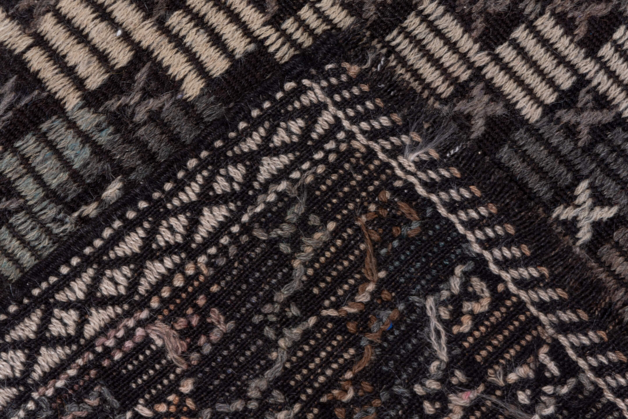 7' x 9' one-of-a-kind handmade vintage Jijim rug. Color palette: black, brown, charcoal, dark gray, dim gray, gray, pink