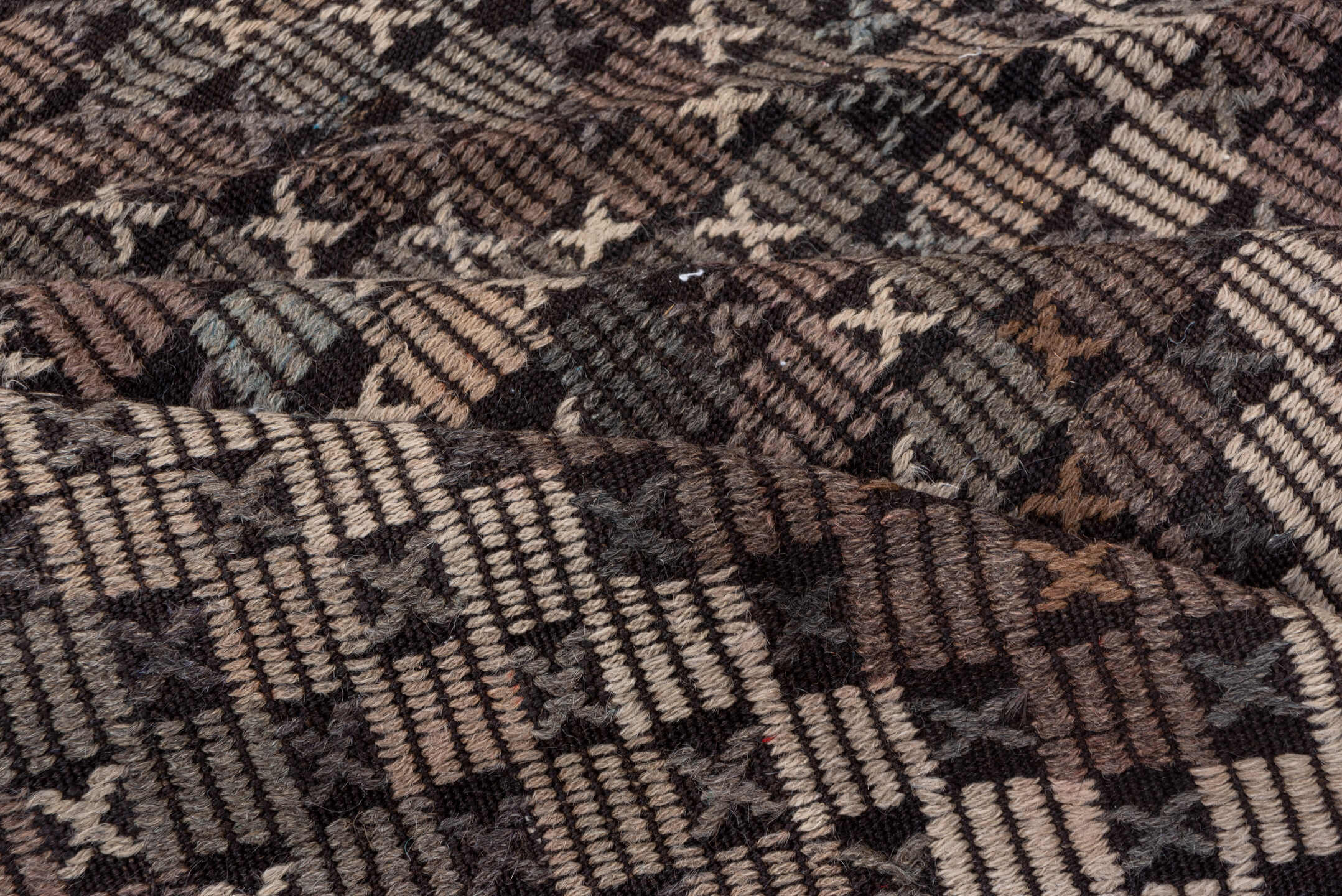 7' x 9' one-of-a-kind handmade vintage Jijim rug. Color palette: charcoal, ivory, slate, taupe, brown, gray, black, beige
