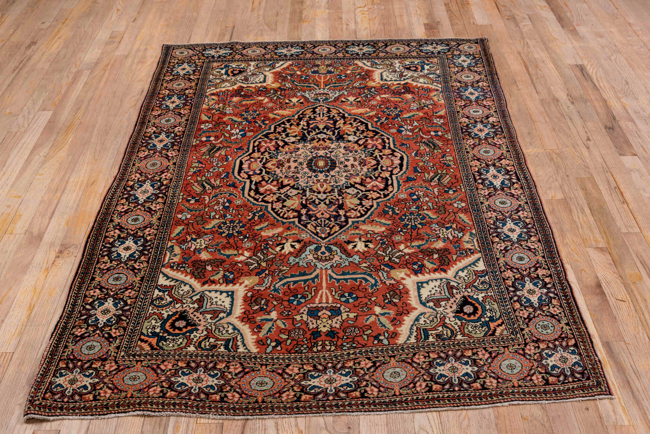 4' x 6' one-of-a-kind handmade antique Far.Sarouk small size rug. Color palette: rust, navy, ivory, soft blue, rose, camel