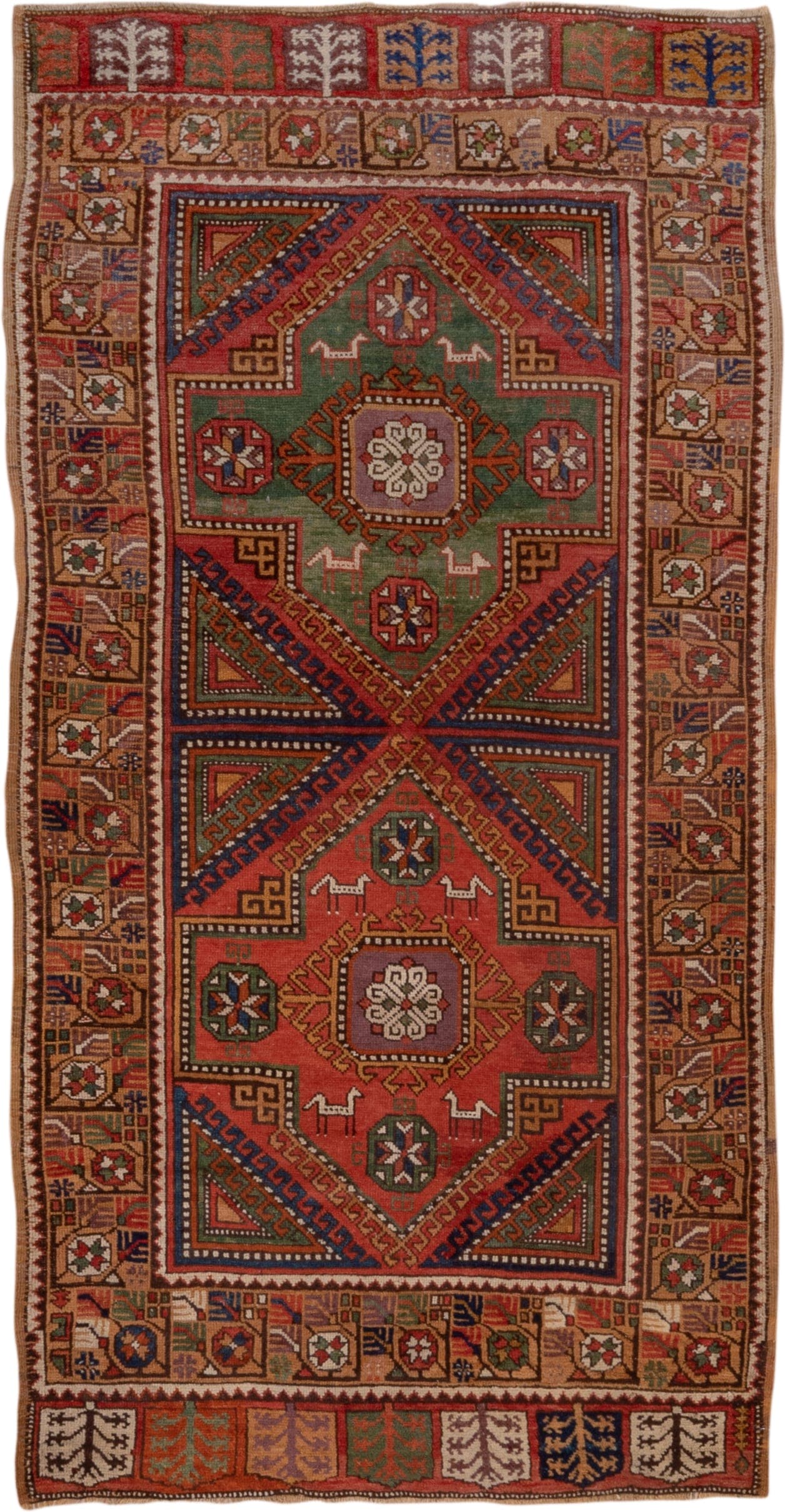 4' x 8' one-of-a-kind handmade antique Konya rug. Color palette: rust, terra cotta, sage, indigo, ivory, camel, burgundy