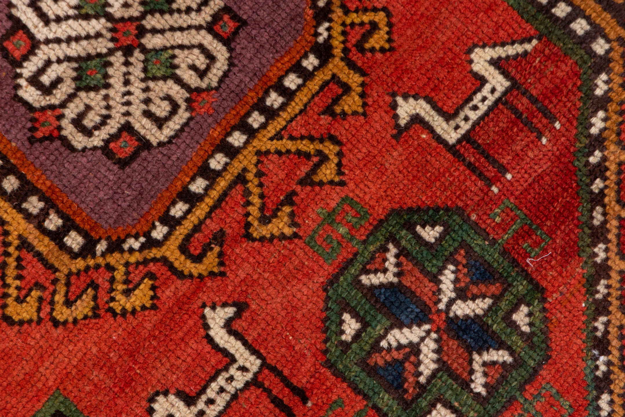 4' x 8' one-of-a-kind handmade antique Konya rug. Color palette: rust, terra cotta, sage, indigo, ivory, camel, burgundy