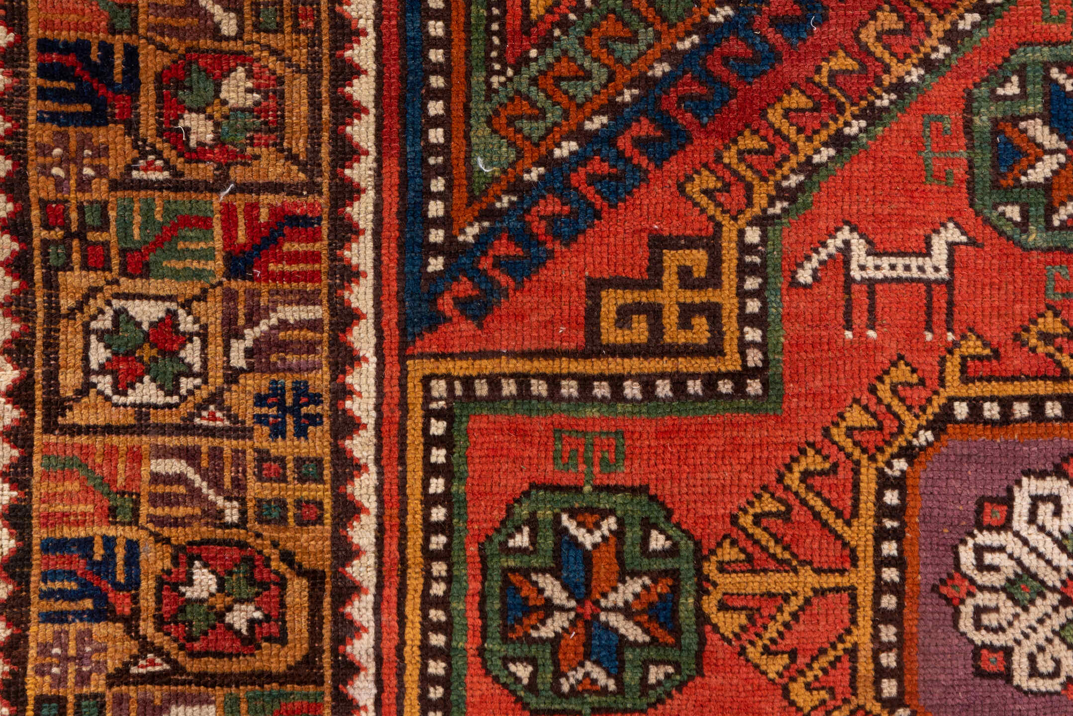 4' x 8' one-of-a-kind handmade antique Konya rug. Color palette: rust, terra cotta, sage, indigo, ivory, camel, burgundy