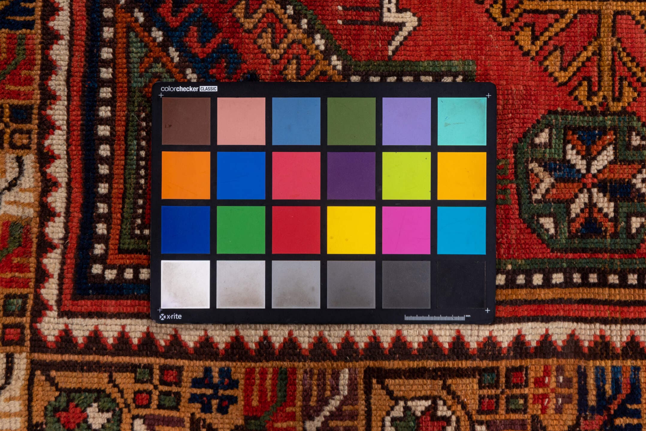 4' x 8' one-of-a-kind handmade antique Konya rug. Color palette: rust, terra cotta, sage, indigo, ivory, camel, burgundy