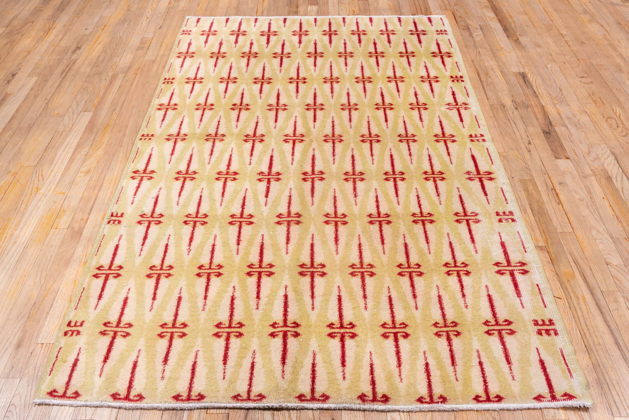 4' x 8' one-of-a-kind handmade vintage Zeki Muran rug. Color palette: ivory, crimson, cream, red