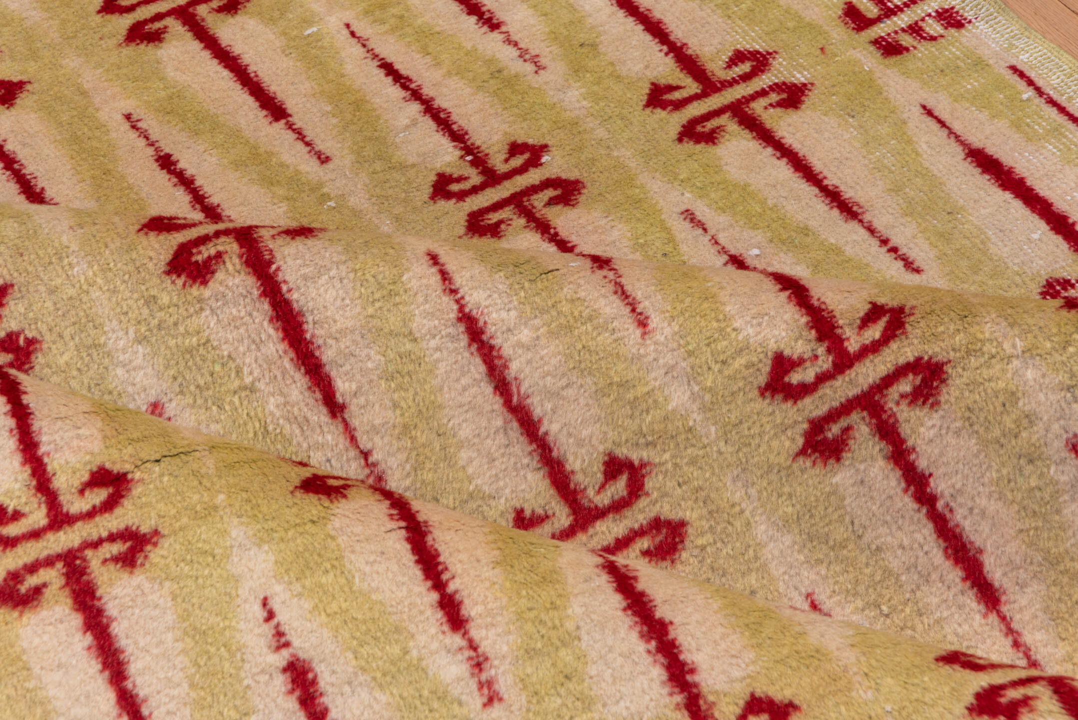 4' x 8' one-of-a-kind handmade vintage Zeki Muran rug. Color palette: brown, burgundy, burlywood, off-white, orange, pink