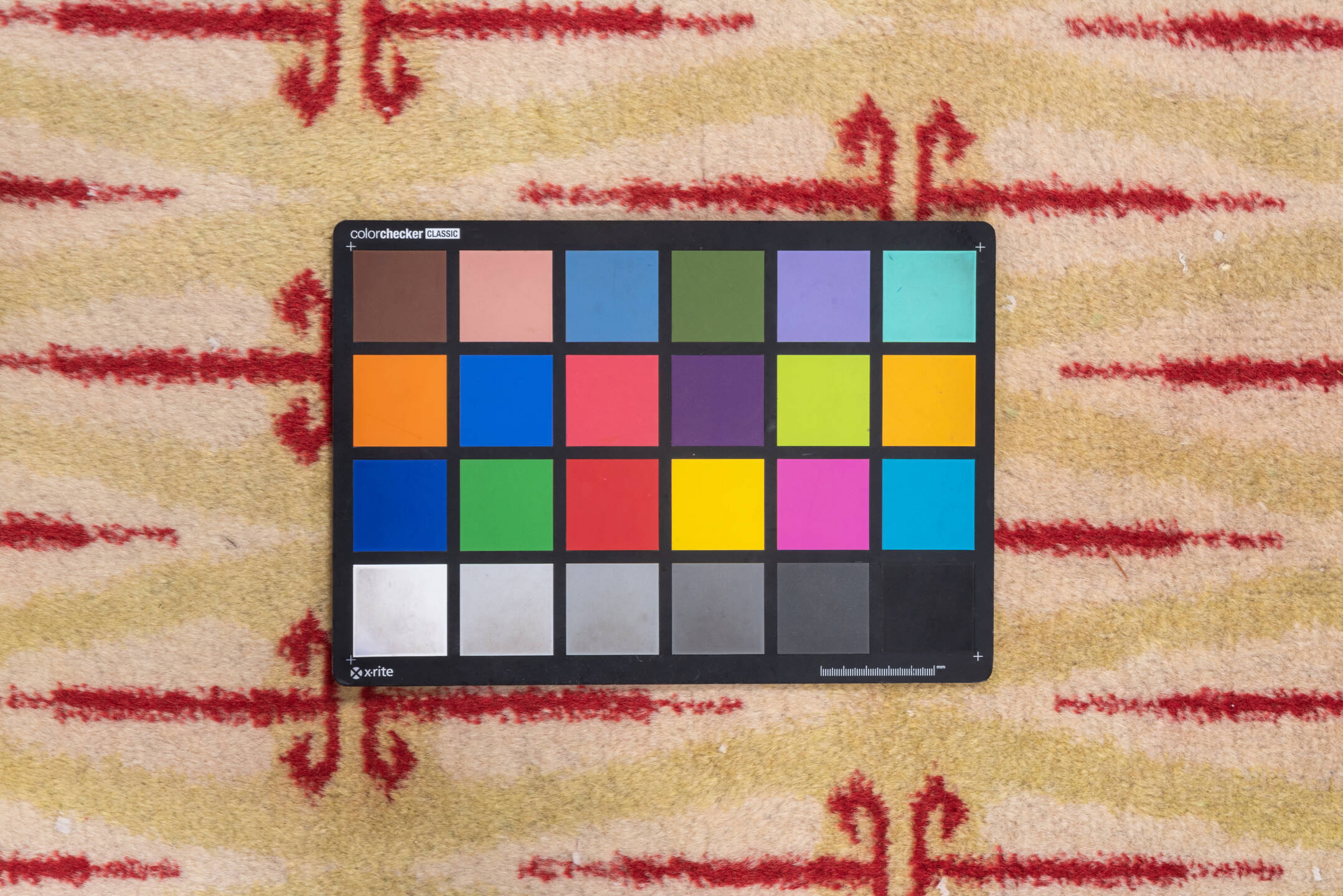 4' x 8' one-of-a-kind handmade vintage Zeki Muran rug. Color palette: brown, burgundy, burlywood, off-white, orange, pink