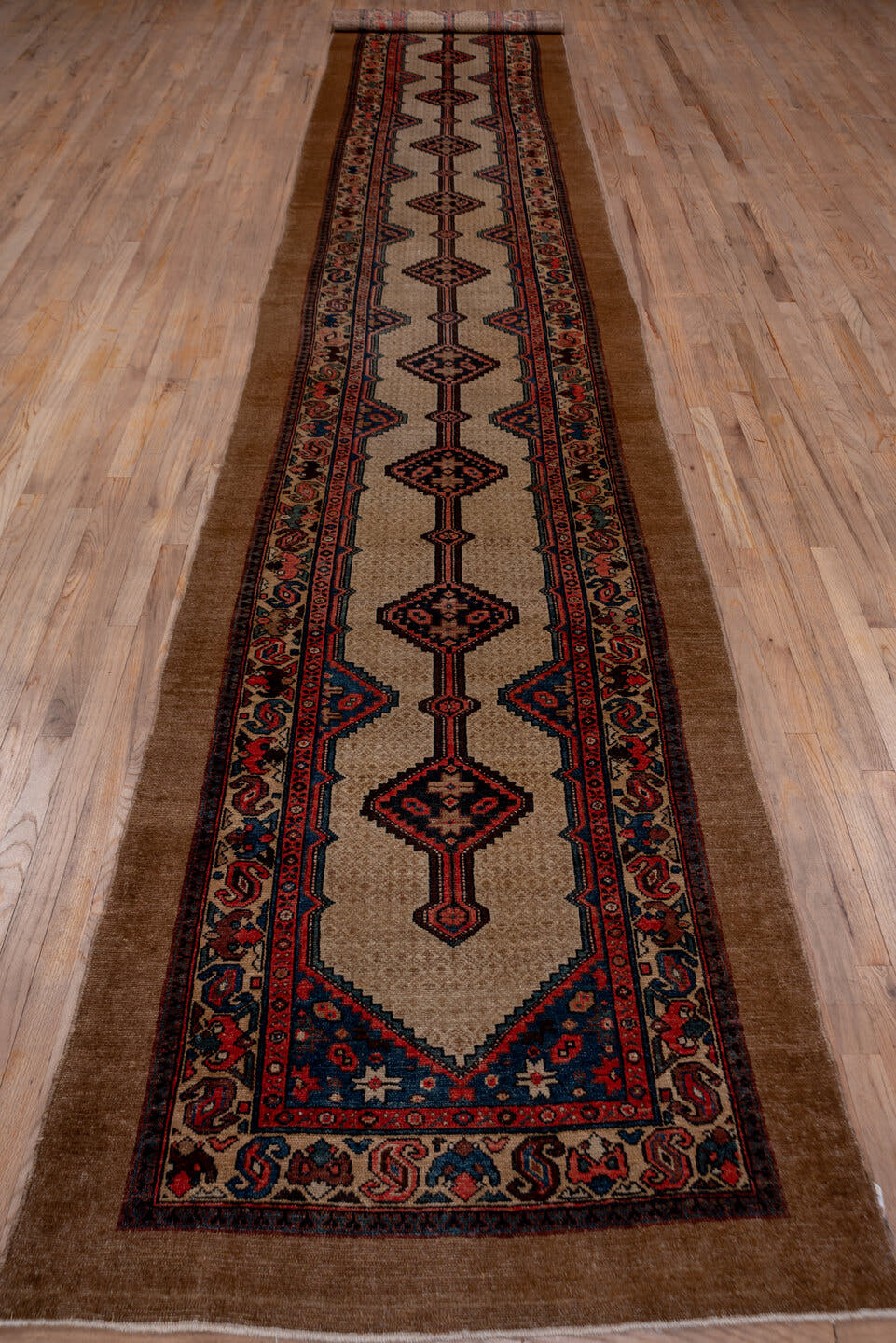 3' x 20' one-of-a-kind handmade antique Cam Hamadan runner rug. Color palette: camel, ivory, indigo, rust, navy, rose, brown
