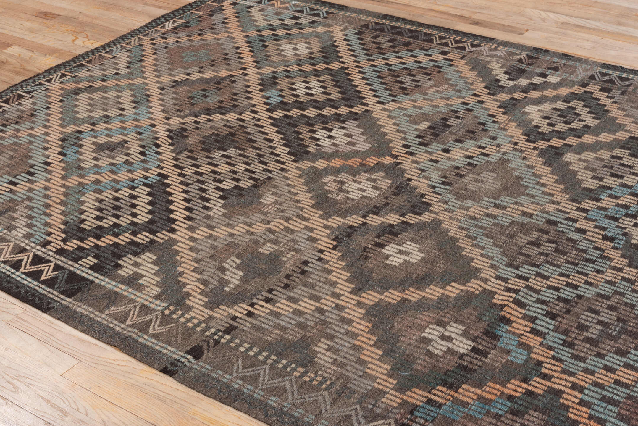 6' x 8' one-of-a-kind handmade vintage Jijim medium size rug. Color palette: brown, charcoal, camel, taupe, ivory, turquoise