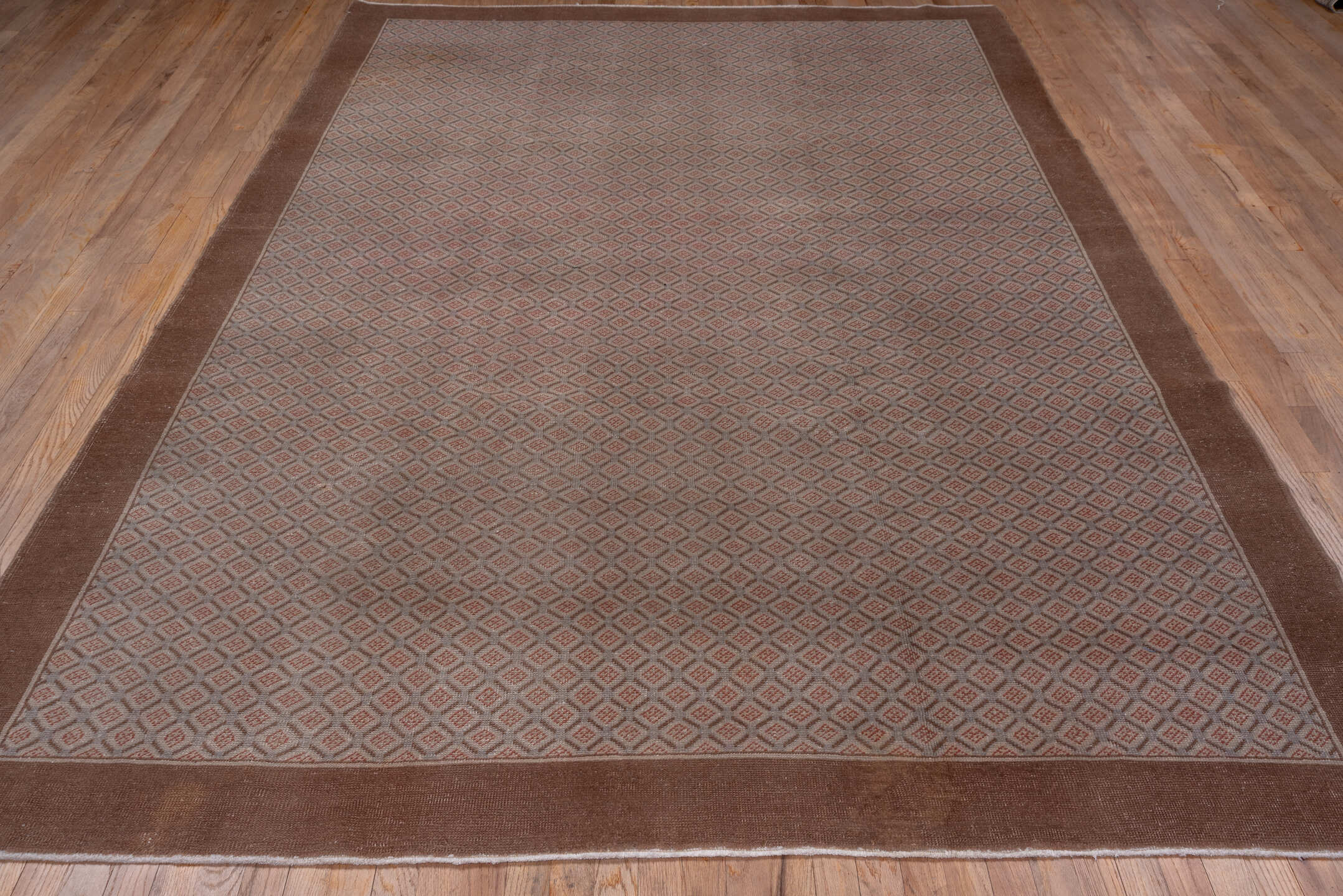 7' x 10' one-of-a-kind handmade vintage Oushak large size rug. Color palette: brown, gray, pink