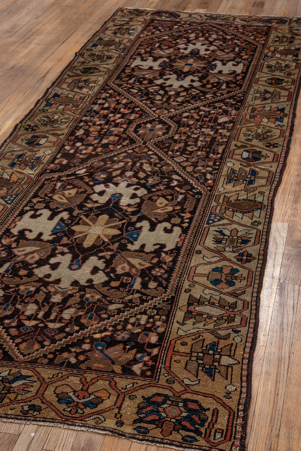 3' x 9' one-of-a-kind handmade vintage Malayer runner rug. Color palette: black, brown, gray, pink, red
