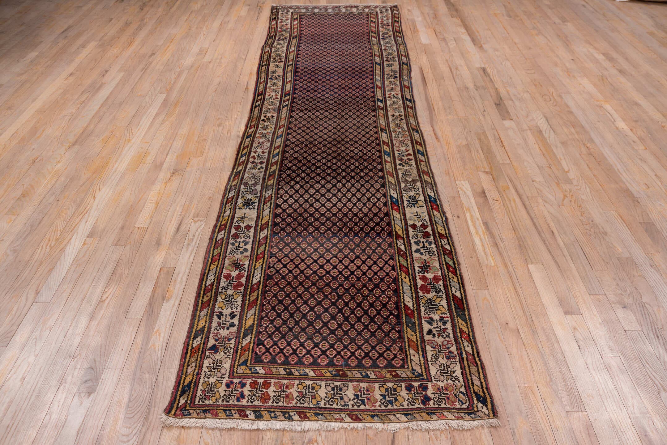 3' x 12' one-of-a-kind handmade antique Malayer runner rug. Color palette: navy, ivory, rust, burgundy, camel, indigo, gold