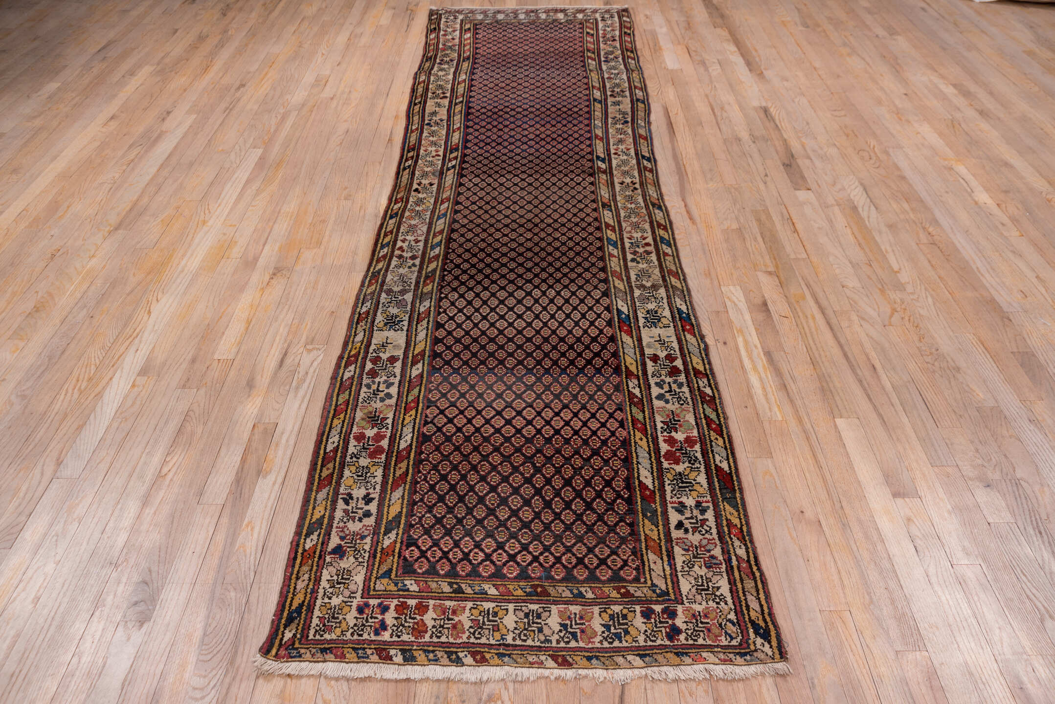 3' x 12' one-of-a-kind handmade vintage Malayer runner rug. Color palette: black, brown, gray, pink, red