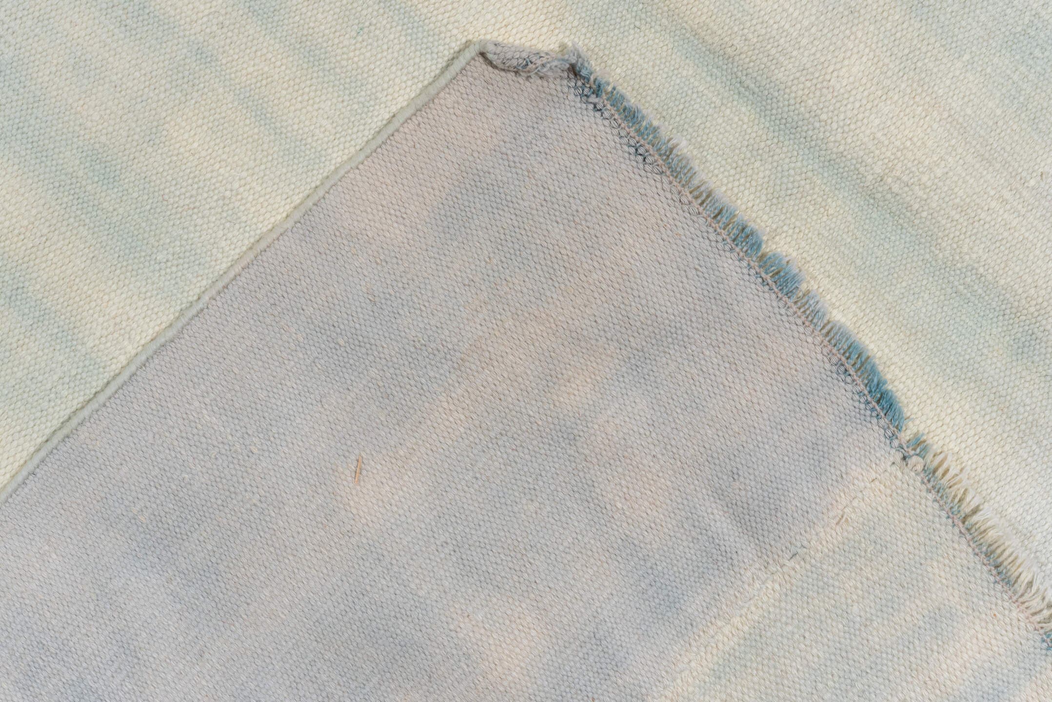 9' x 14' one-of-a-kind handmade antique Dhurrie large size rug. Color palette: ivory, pale blue, sky blue, light blue