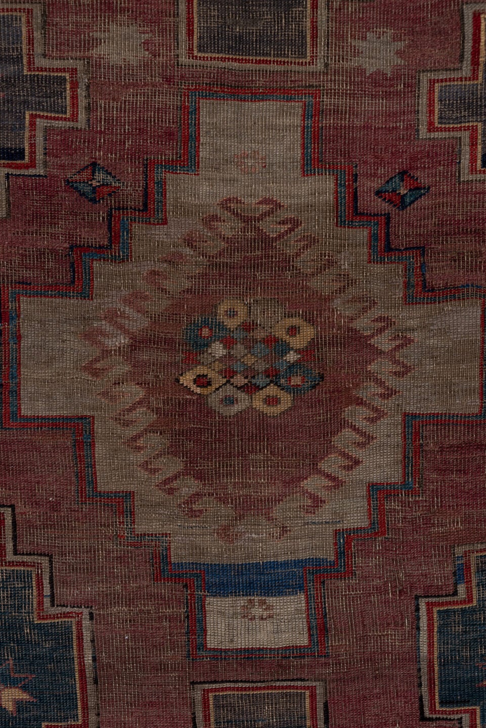 4' x 7' one-of-a-kind handmade antique Trans Caucasian rug. Color palette: rose, dusty rose, ivory, indigo, rust, taupe