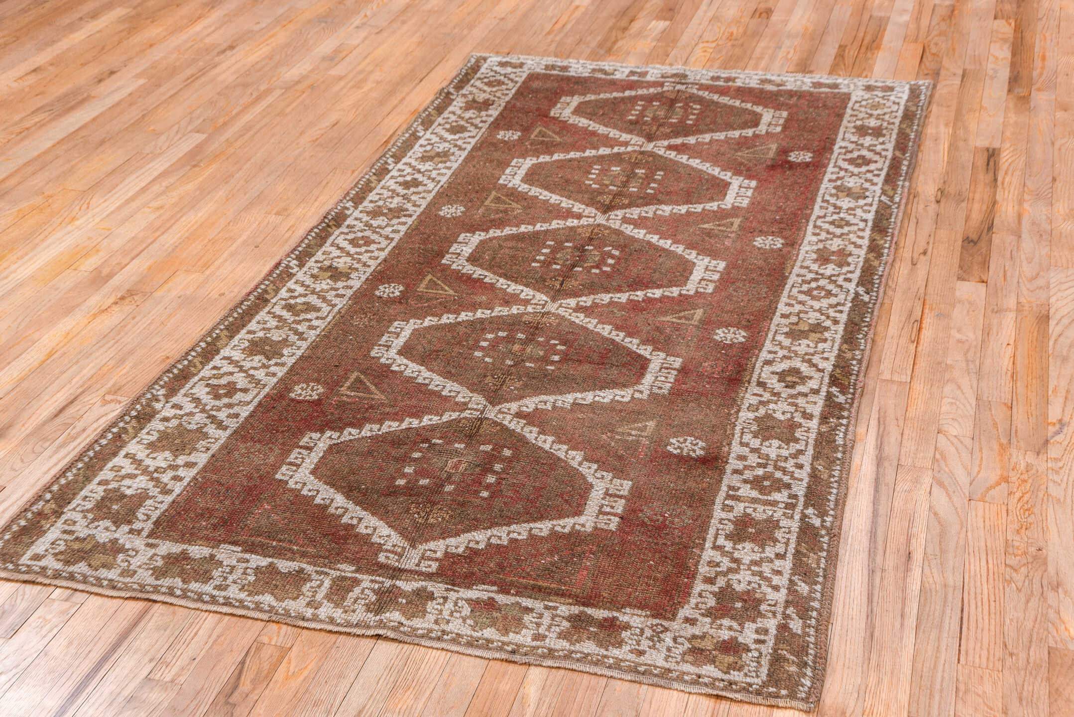 4' x 8' one-of-a-kind handmade vintage Oushak rug. Color palette: brown, gray, light gray, off-white, pink, red, redwood
