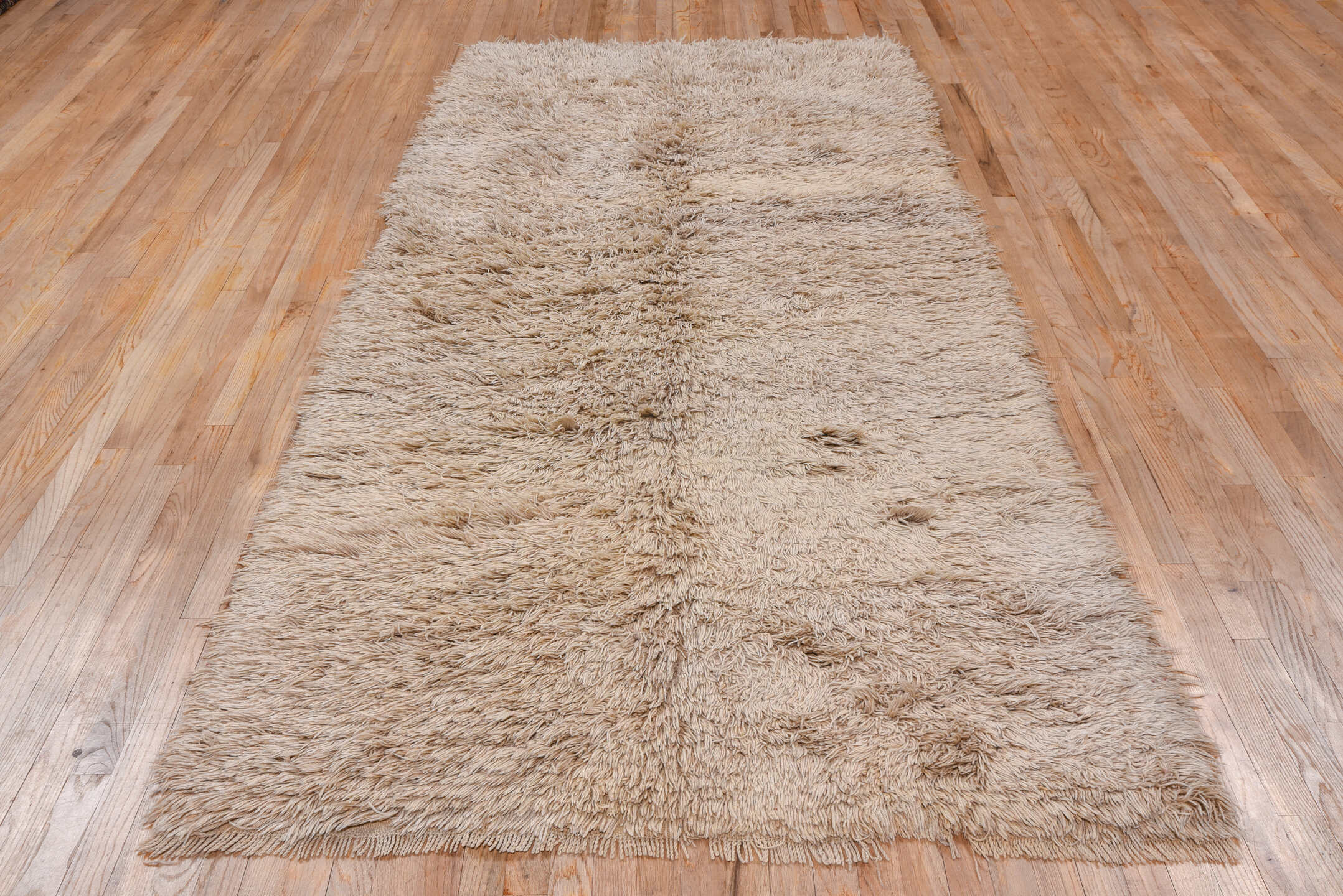4' x 9' one-of-a-kind handmade vintage Tulu rug. Color palette: brown, gray, light gray, off-white, pink, snow, white