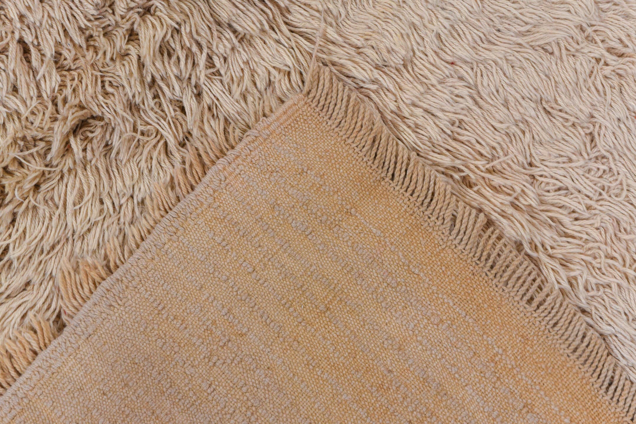 4' x 9' one-of-a-kind handmade vintage Tulu rug. Color palette: ivory, beige, taupe, cream, gray