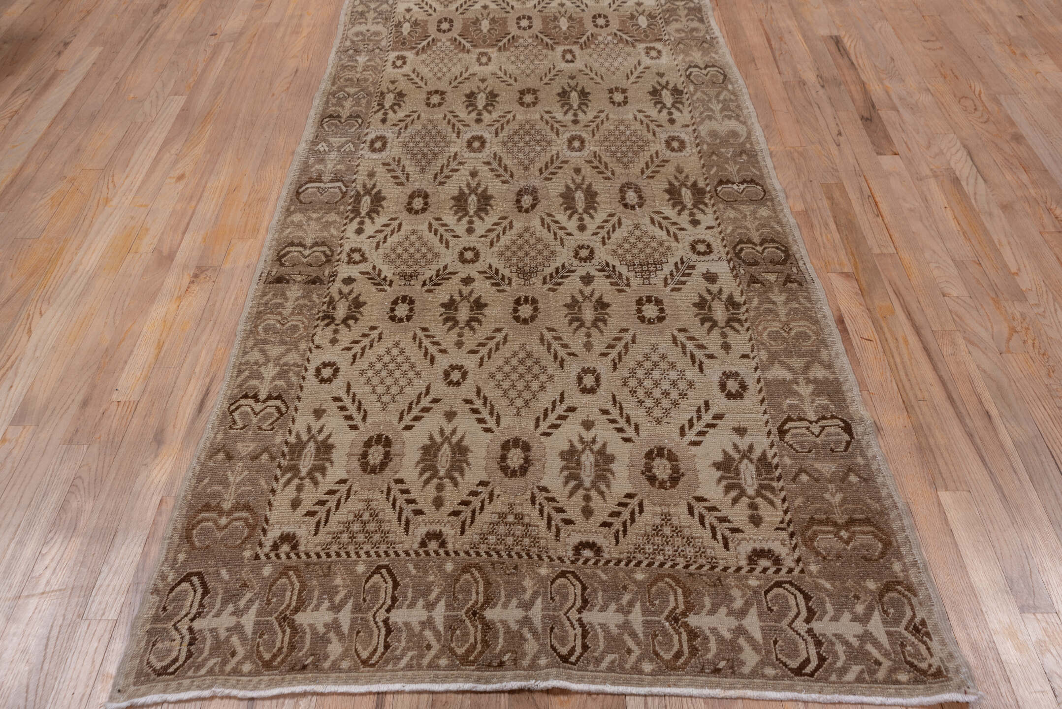 4' x 9' one-of-a-kind handmade vintage Oushak runner rug. Color palette: brown, gray, light gray, off-white, pink