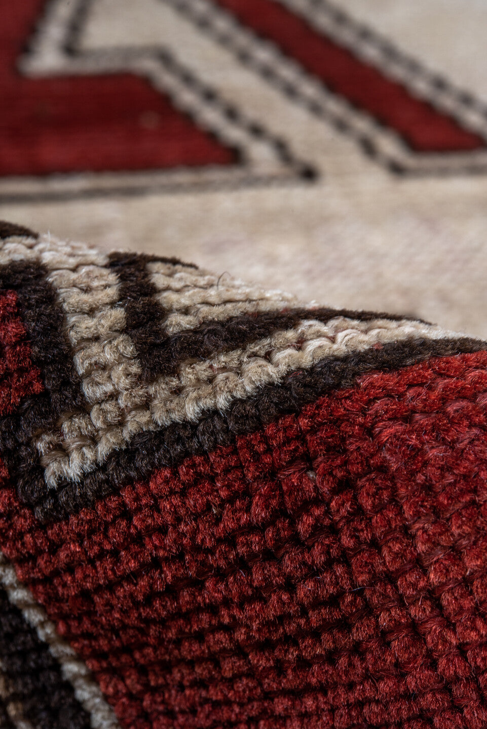 2' x 7' one-of-a-kind handmade vintage Trans Caucasian runner rug. Color palette: brown, off-white, pink, red, snow, white