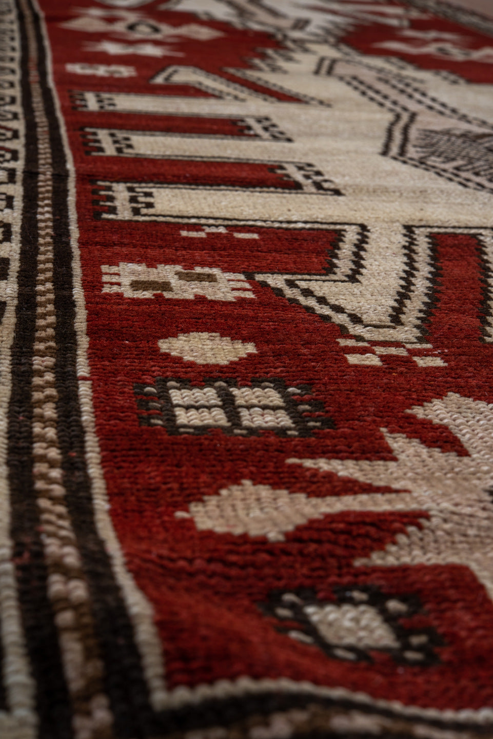 2' x 7' one-of-a-kind handmade vintage Trans Caucasian runner rug. Color palette: brown, off-white, pink, red, snow, white