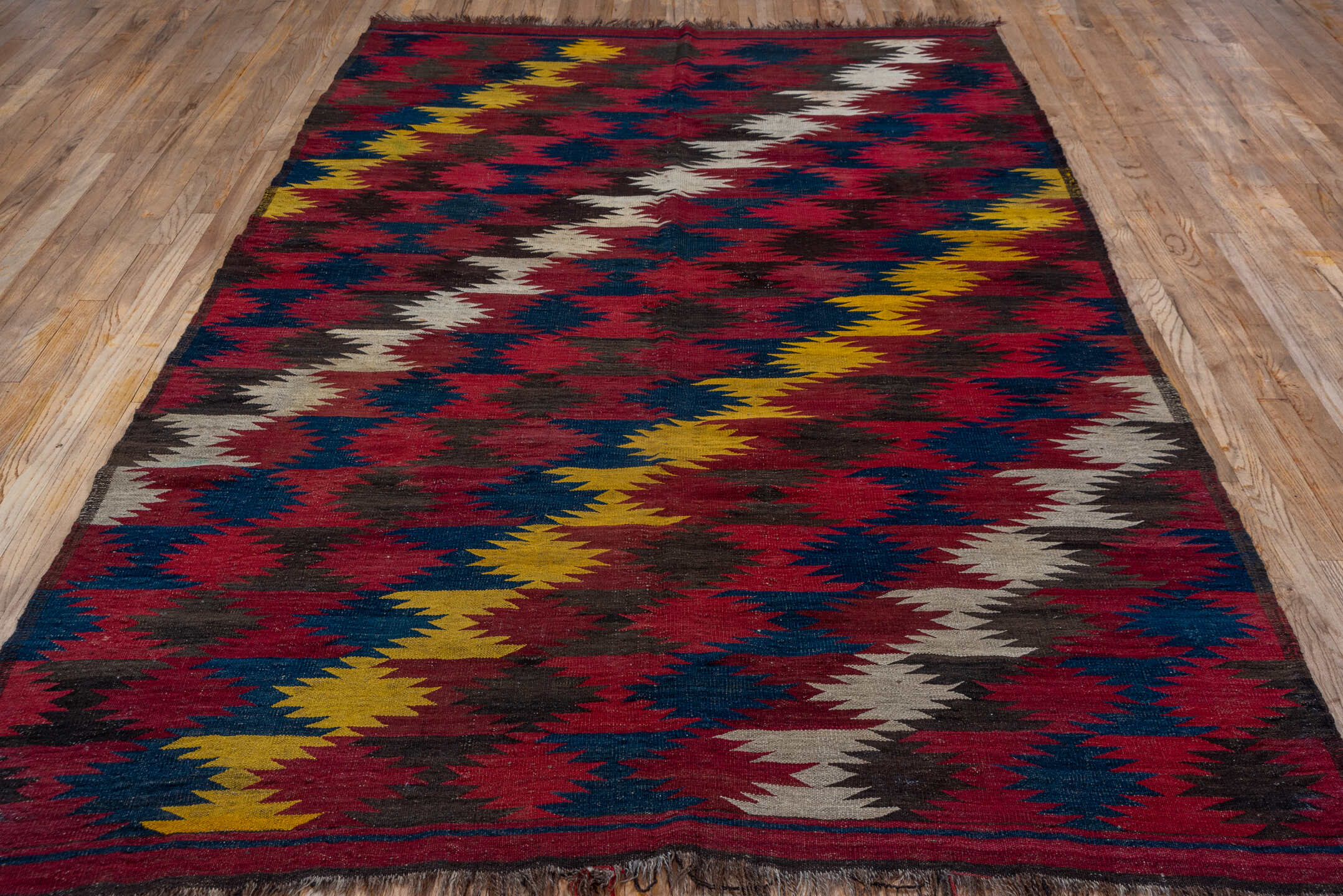 6' x 9' one-of-a-kind handmade vintage Kilim medium size rug. Color palette: black, brown, gray, pink, red