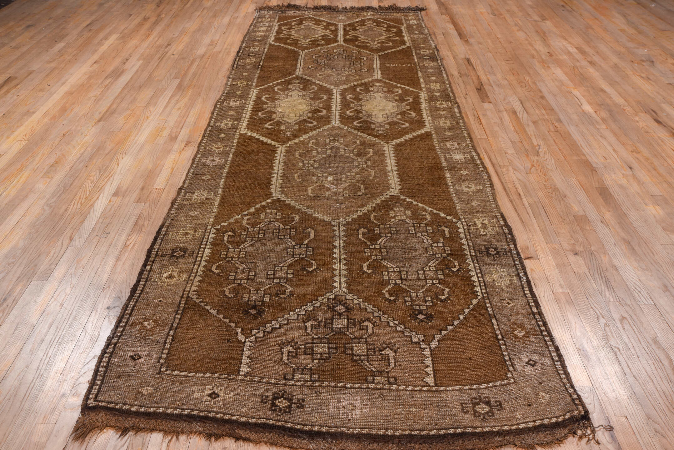 4' x 12' one-of-a-kind handmade vintage Kars runner rug. Color palette: brown, taupe, camel, ivory, beige, gray